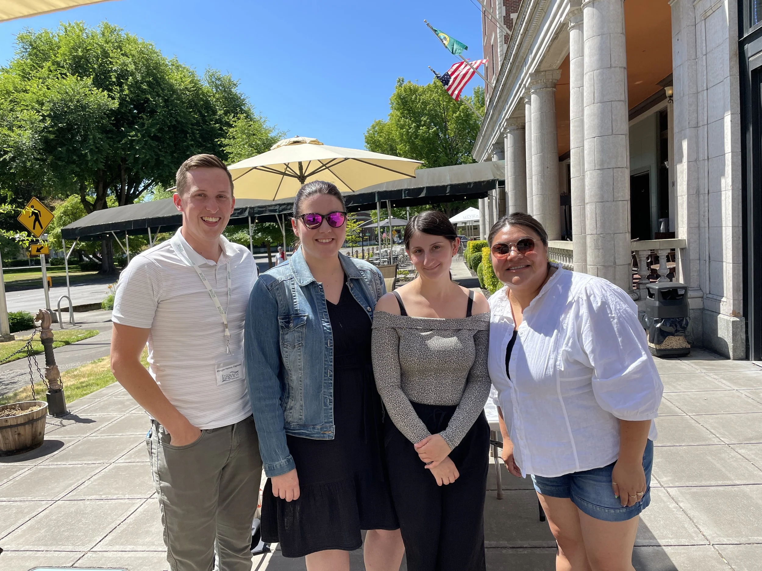 Team standing and smiling.JPG