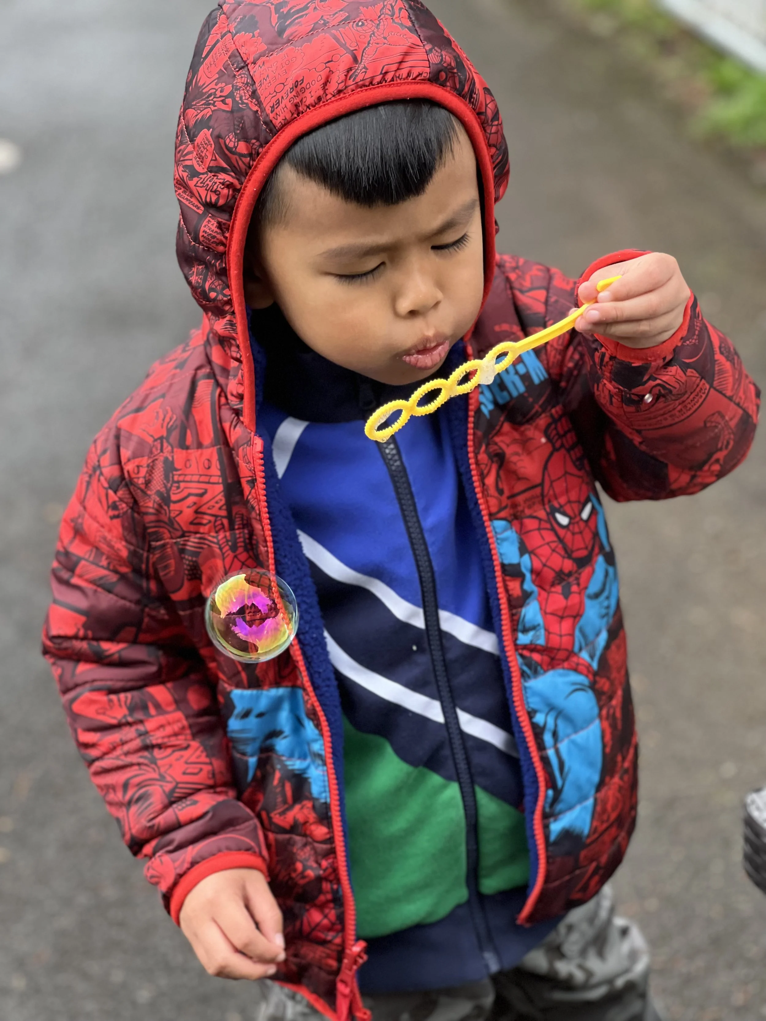 Image 4: A woman looking at a blueprint