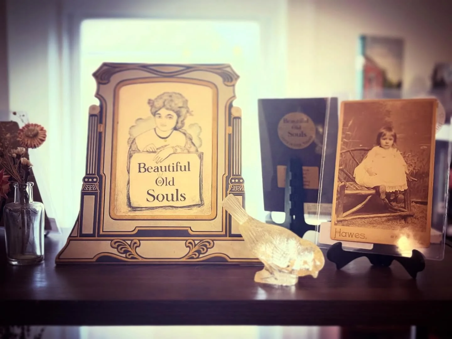 We have a new display! @beautiful_old_souls has curated a lovely shelf full of antique photos for sale. There are some really unique treasures in this collection. Come take a look upstairs in the fiction room!