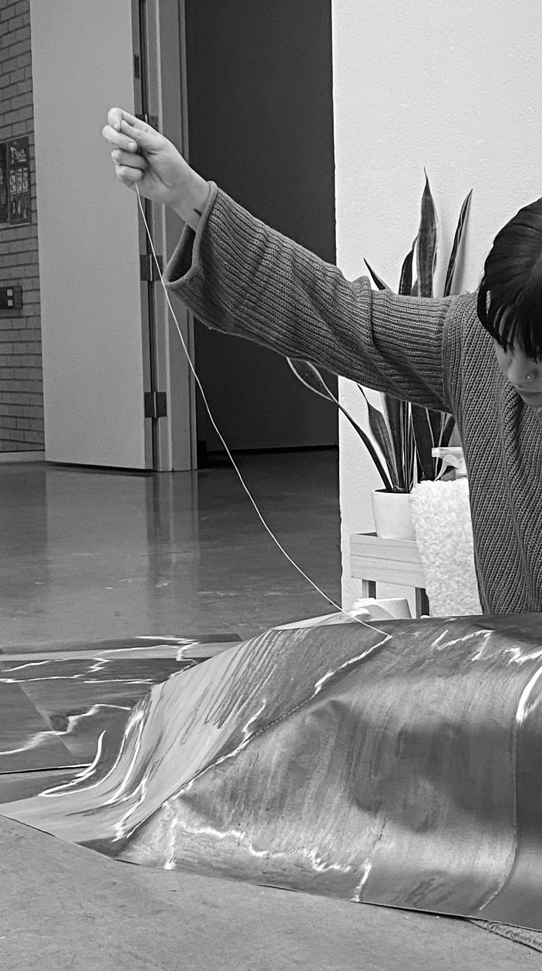 "Noted", 2023, Performance consisting of  7 hours of sewing into a painted canvas