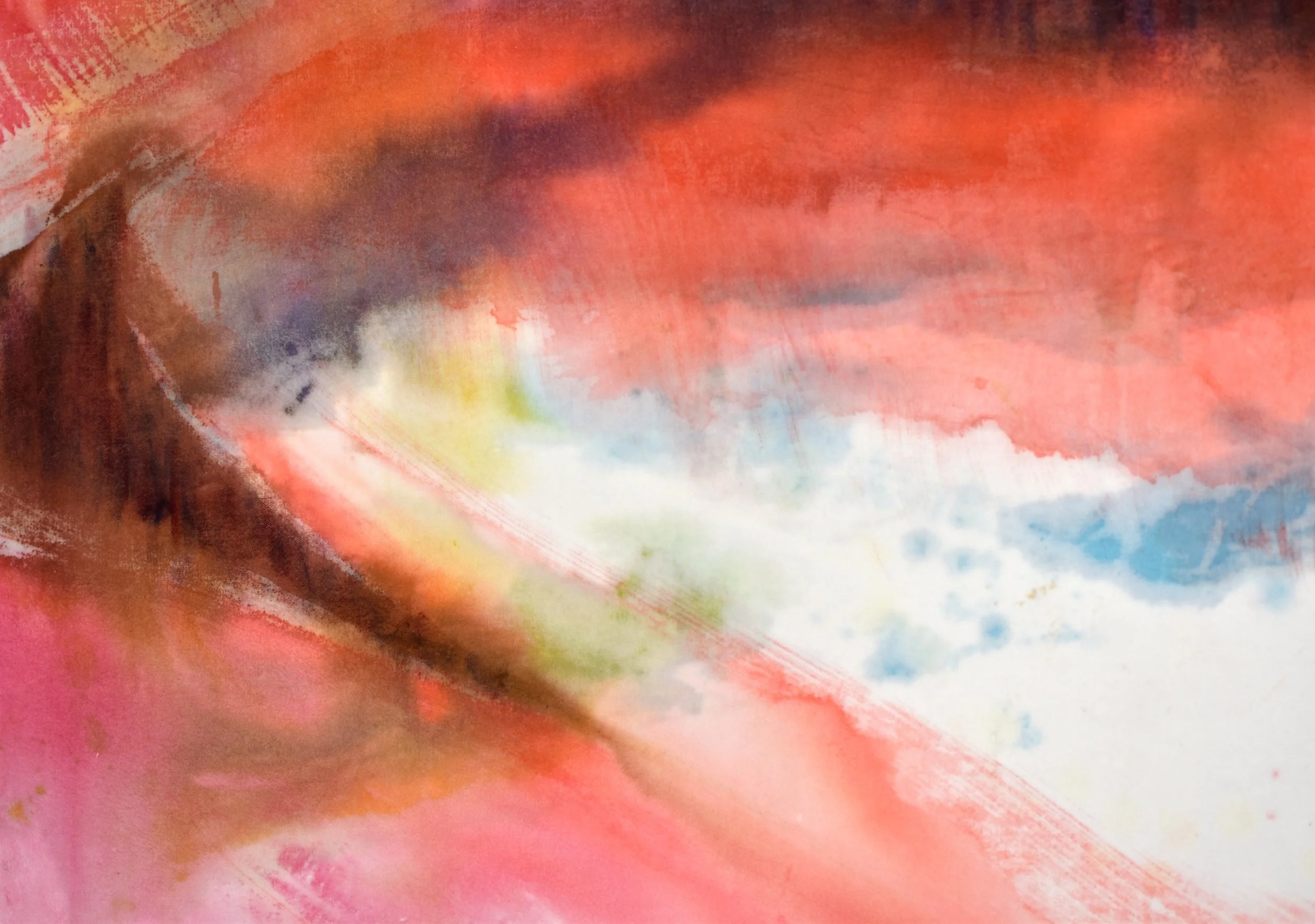 Close-up of a textured, abstract surface with mottled pink, red, brown, white and blue.