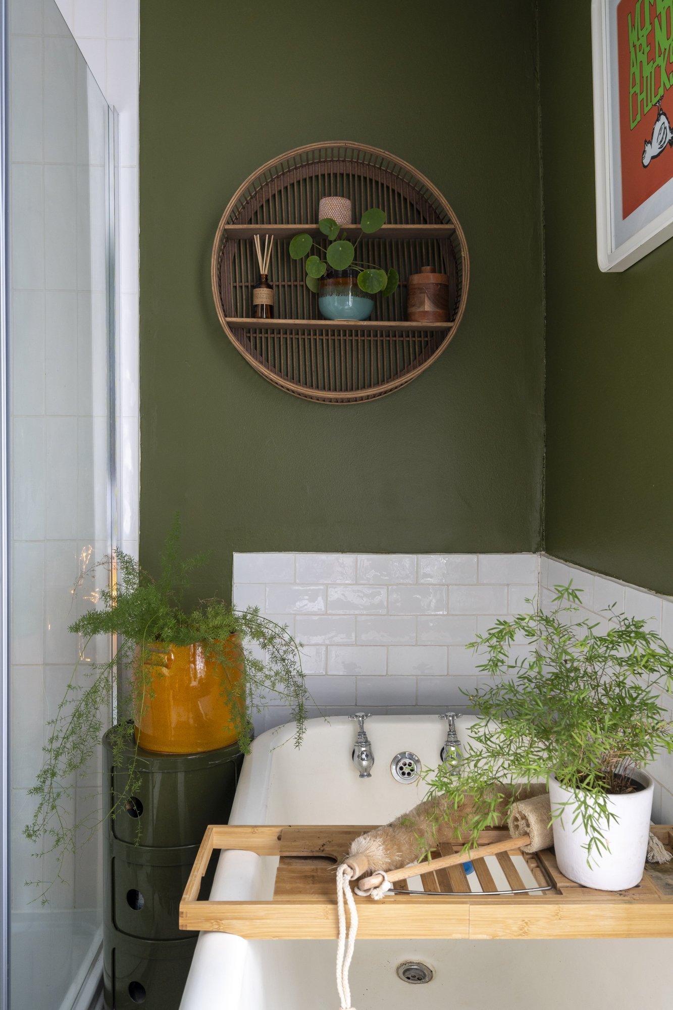 Mossy green works so well in a bathroom, especially when plants are added for a very naturalistic feel.