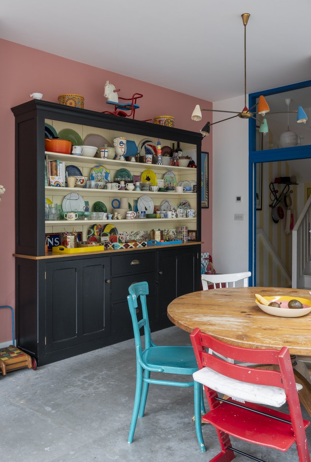 A dresser of dreams against a beautiful huggable pink wall