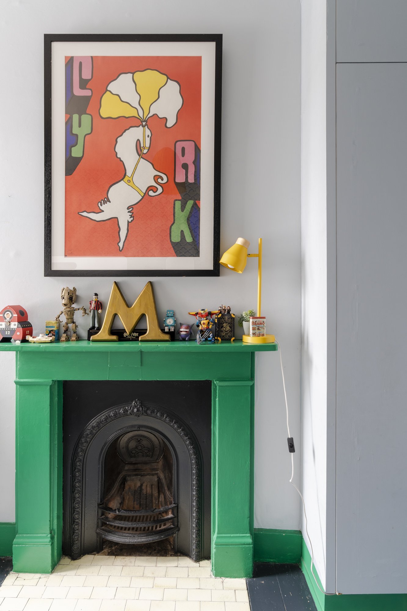 The perfect colour pop. I love how the fireplace surround colour continues across the skirting.