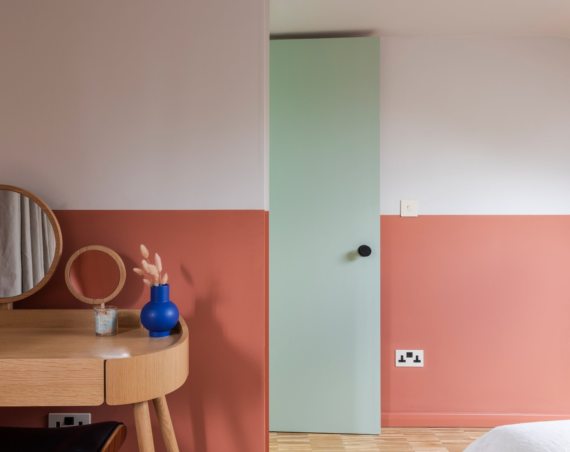 Terracotta and green should always be seen. It’s always good to consider the juxtaposition of colours when you open a door.