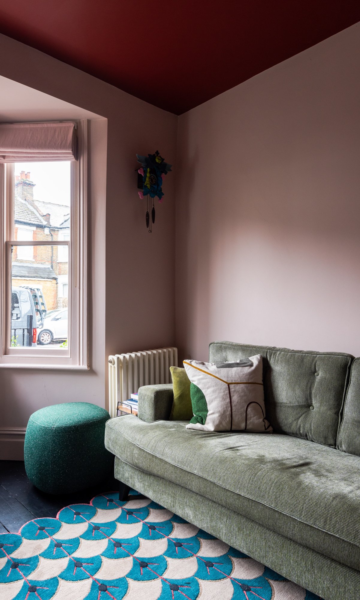 This dusty pink feels so nurturing. You are fully cocooned by the incredible deep red ceiling.