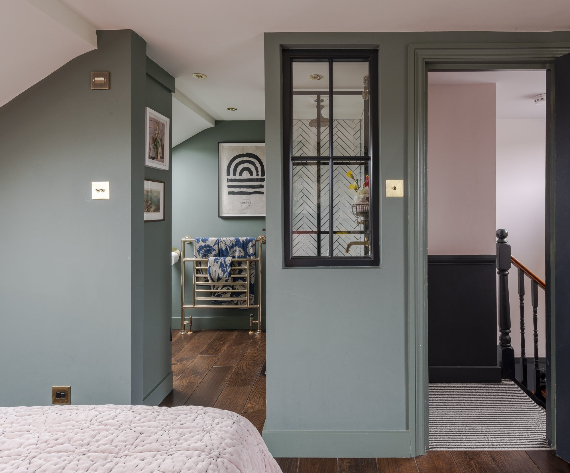 Dusty green is super soothing, ideal for a dreamy loft bedroom.