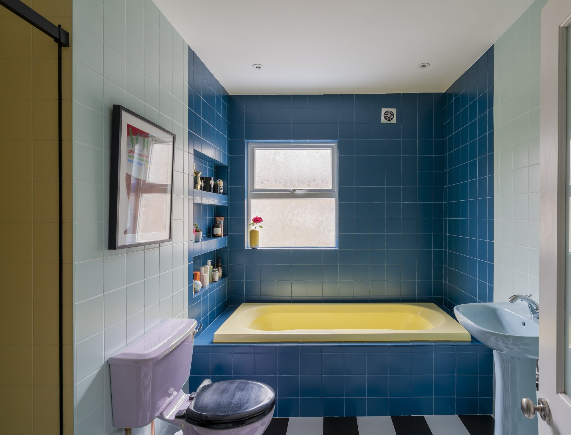 Colour blocking perfection and have you ever seen such a cool bathroom suite?!