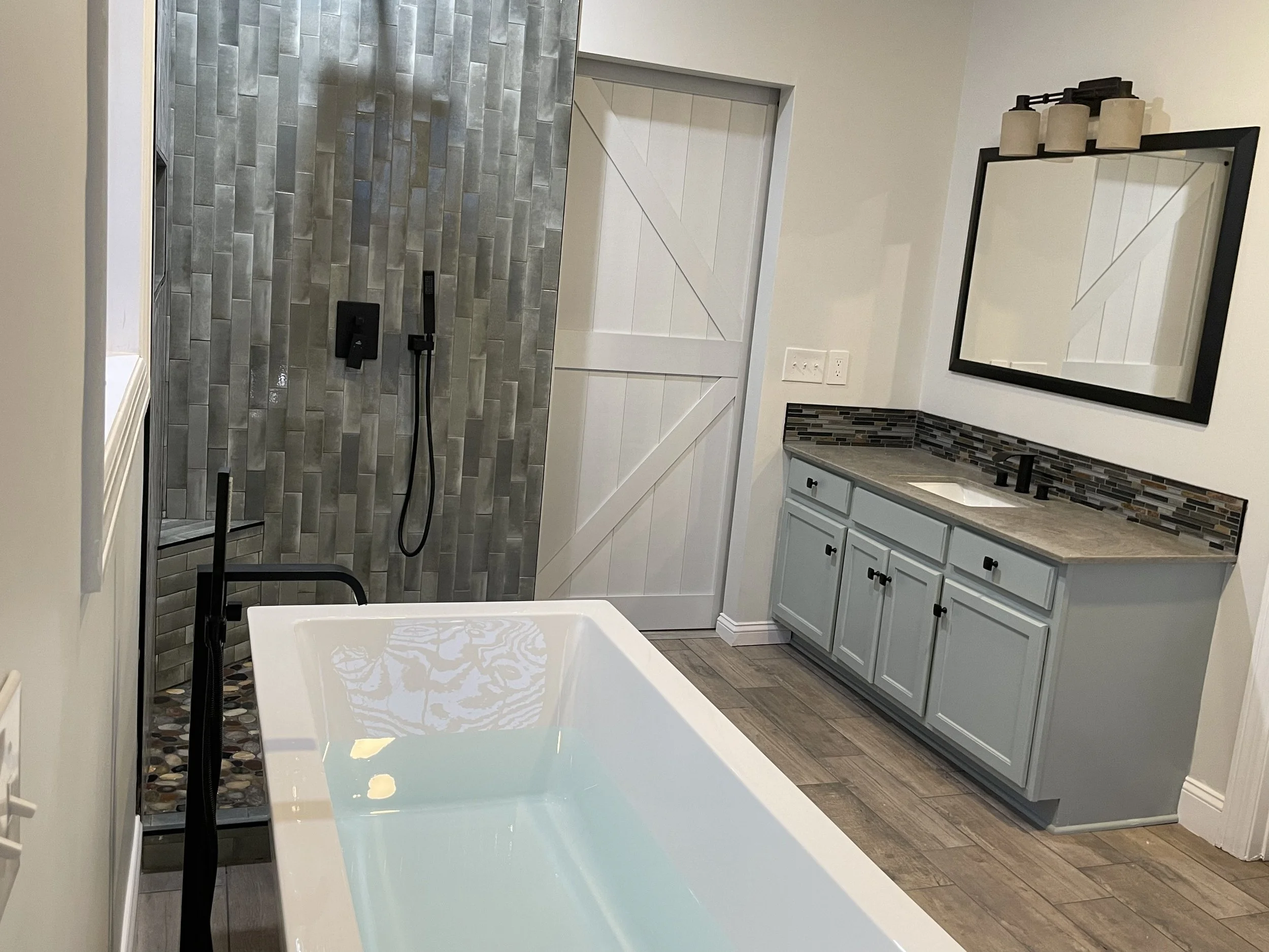 Bathtub, Shower, & His Vanity After (Evans).JPG