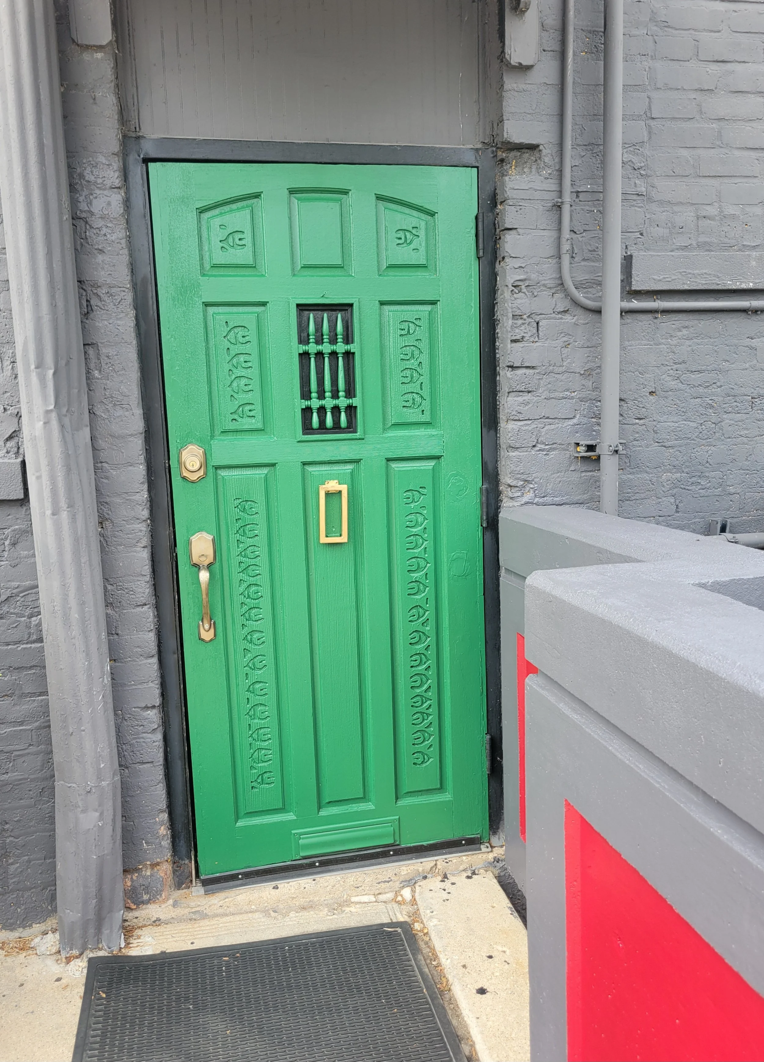 Back green door. Secret entrance.