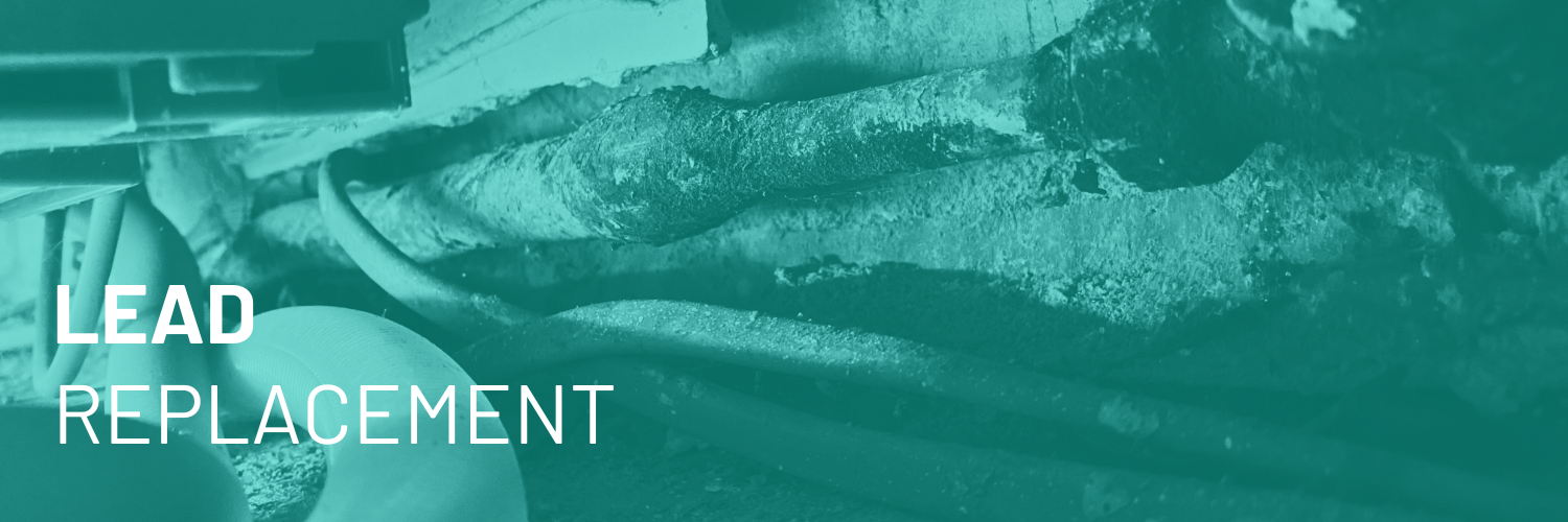Close-up view of a corroded or damaged pipe with the text 'Lead Replacement' overlaid.
