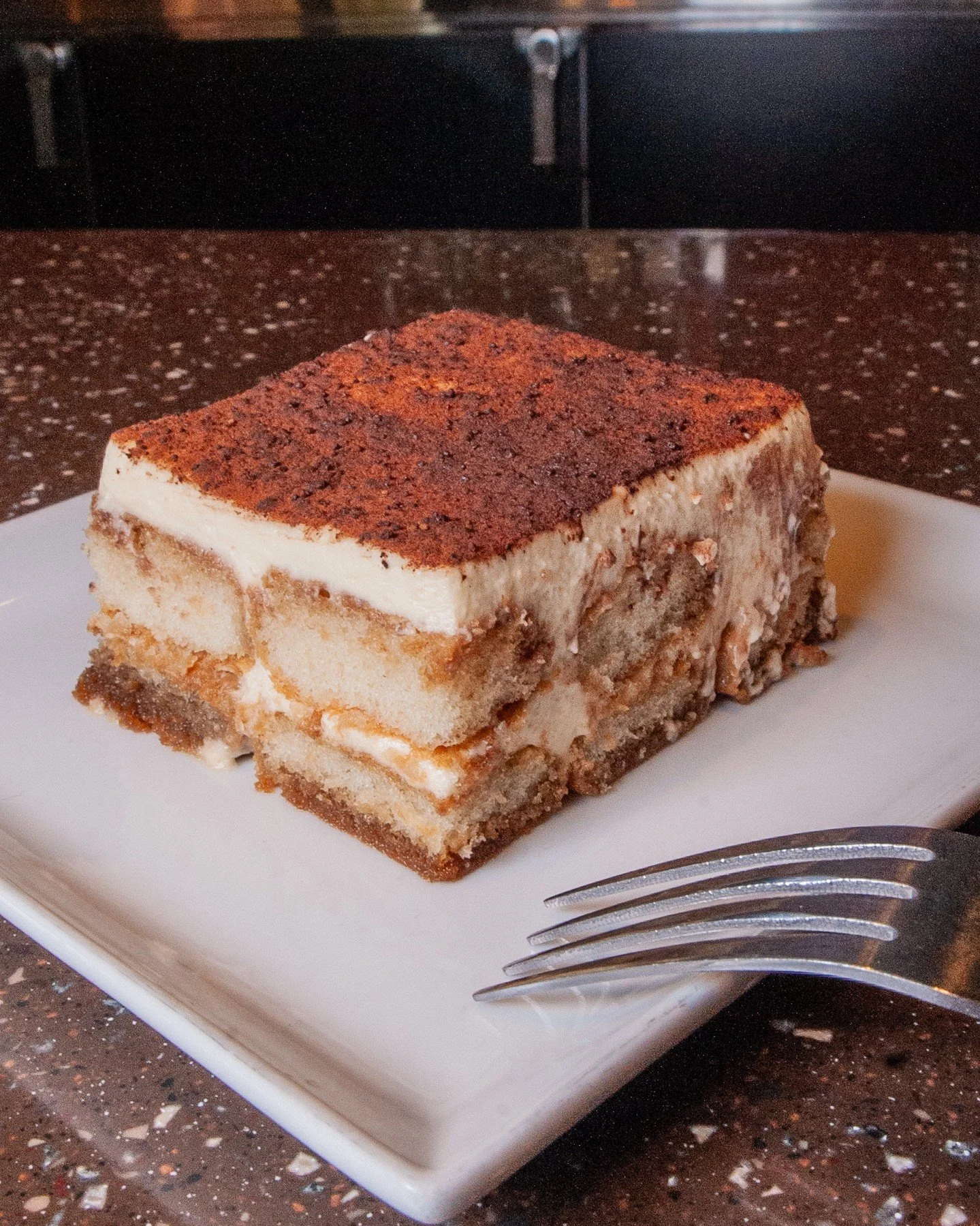 Treat yo'self to some tiramisu! Espresso-soaked ladyfinger cookies, layered with a rich mascarpone cheese cream, and finished with a dusting of Dutch cocoa powder. Yummmmm!⁠
⁠
For a limited time, grab a FREE slice when you purchase any 2 Large Origin