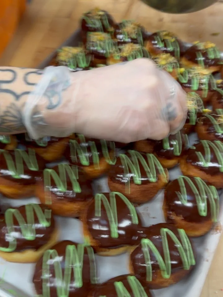 Prepping Dude, Byes for today. Sold out yesterday so come early 

Dude, Bye Chocolate
The ultimate breakup donut&mdash;sweet revenge never tasted so good. Created by our own Vanessa after kicking her Dubai-chocolate-loving ex to the curb, this bold b