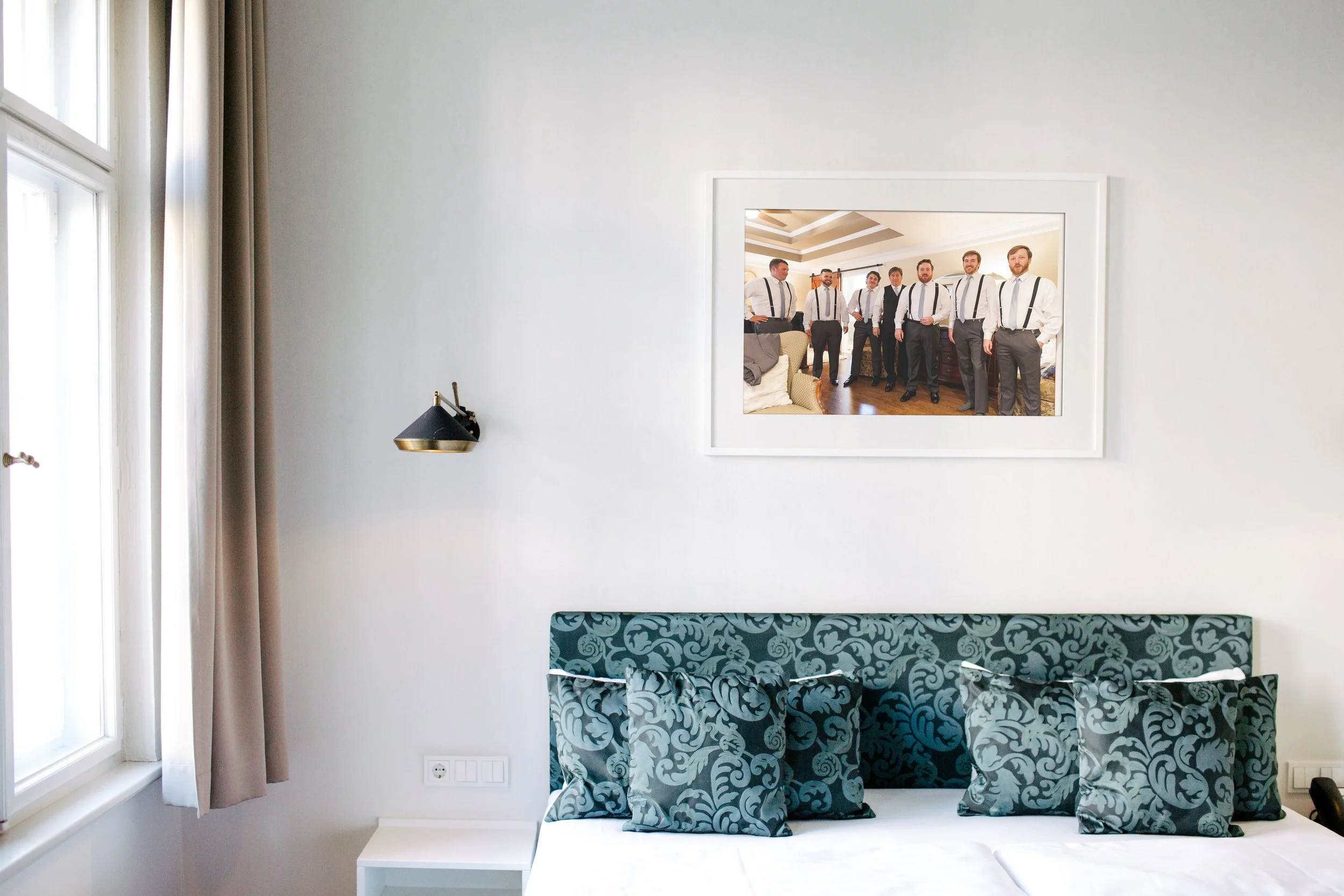 Picture frame on a white wall with sofa.jpg