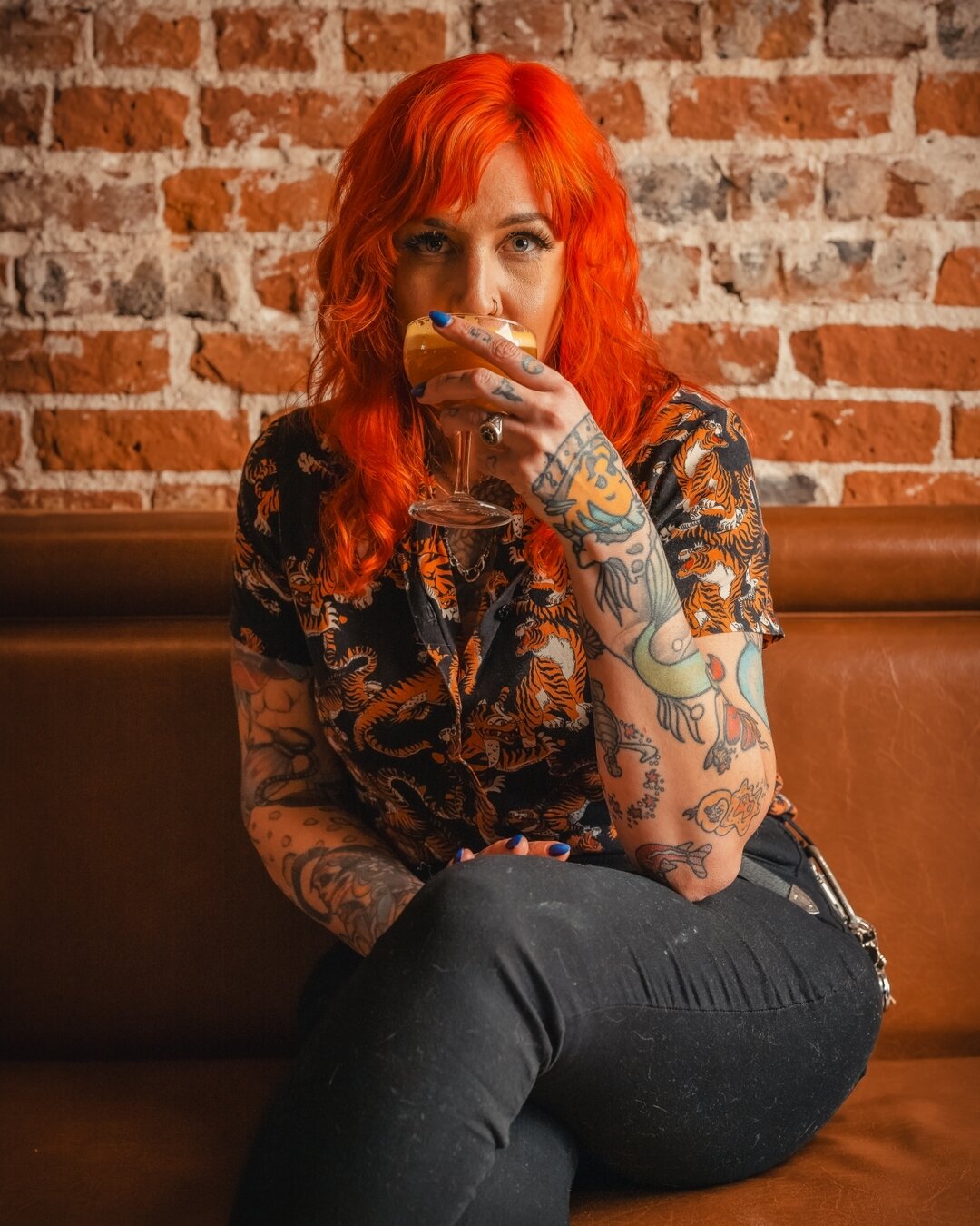 Say Hello! to Kristin (a.k.a. K), Hudson Hill&rsquo;s Bar Manager and mixologist extraordinaire.  You&rsquo;ll recognize Kristin by their signature vibrant red hair and glittery eyeshadow.  A serious devotee to the knowledge of their craft, K pores o