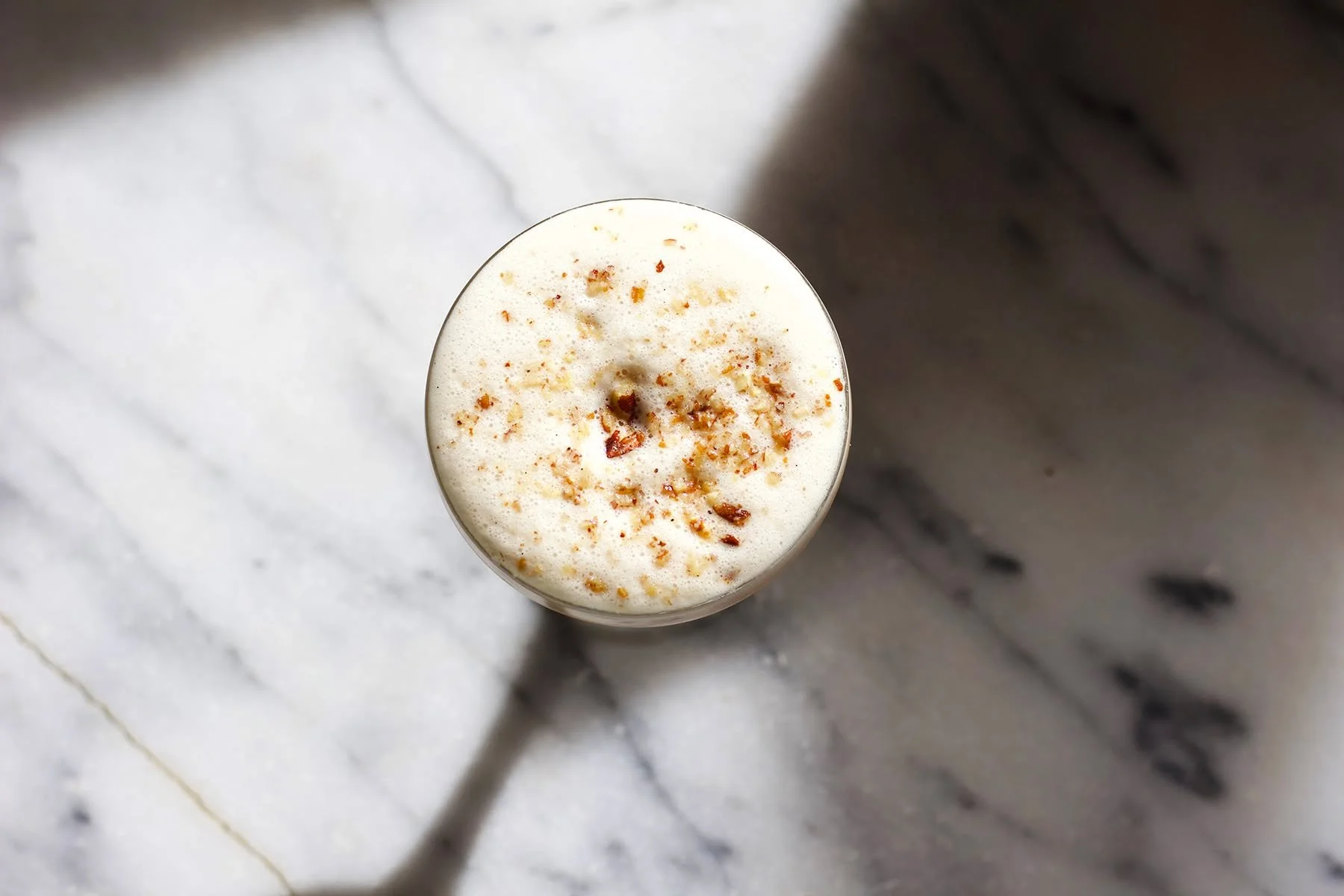 It's National Pie Day!  Since we're a bar and not a bakery, we don't serve pie, so you should definitely bring us some 

Or you could have this pecan pie-in-a-glass cocktail, Don't Pecan Me: Cask Strength Bourbon, Pecan Orgeat, Vanilla, Oat Milk, Veg