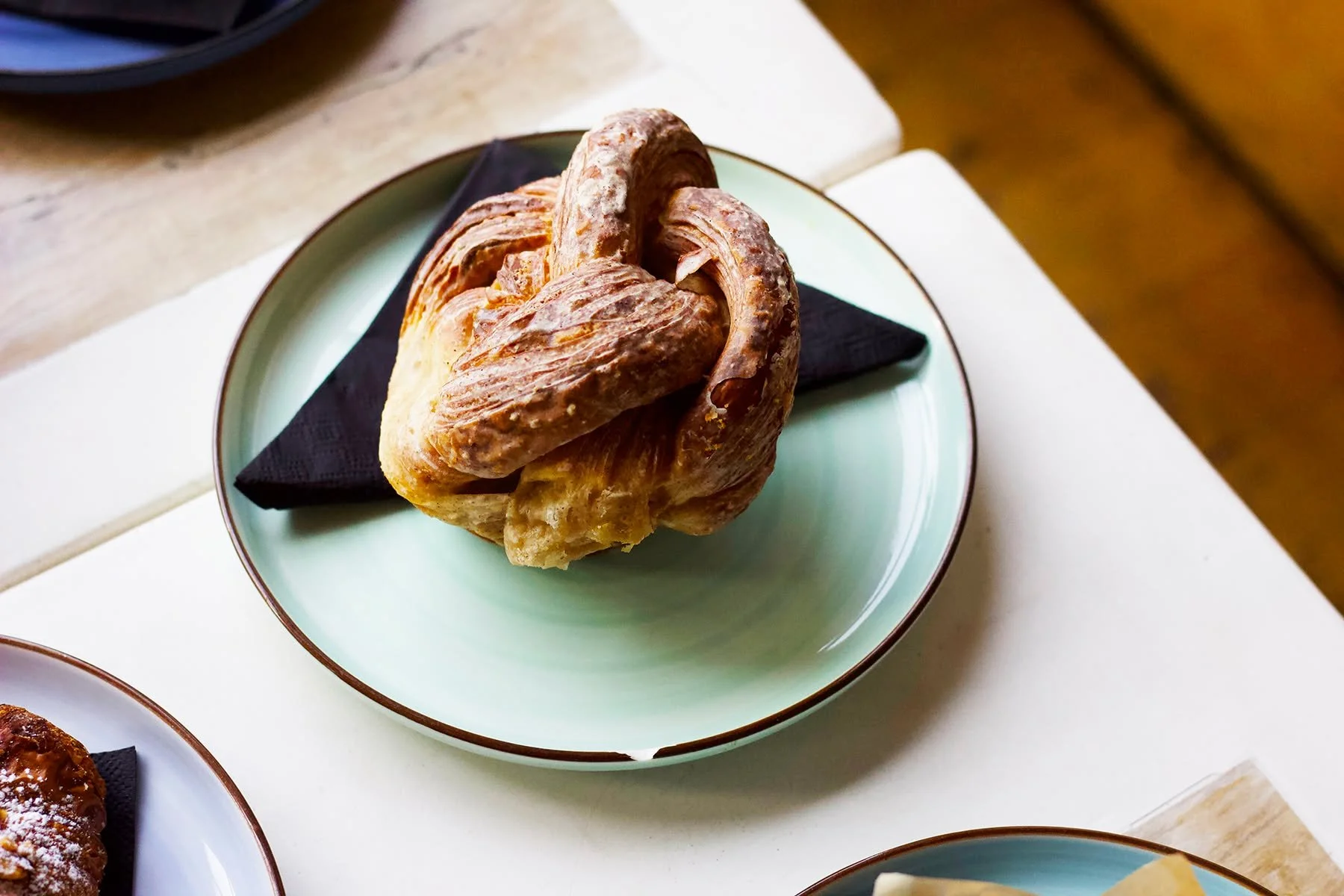Start your morning off sexy with seductive pastries like this Cardamom Twist from Rebel Bread.  And coffee - coffee is an absolute must!

Last start?  Coming in after 12 noon?  Buy a pastry, get a free cup of MiddleState Coffee!  This math is mathing