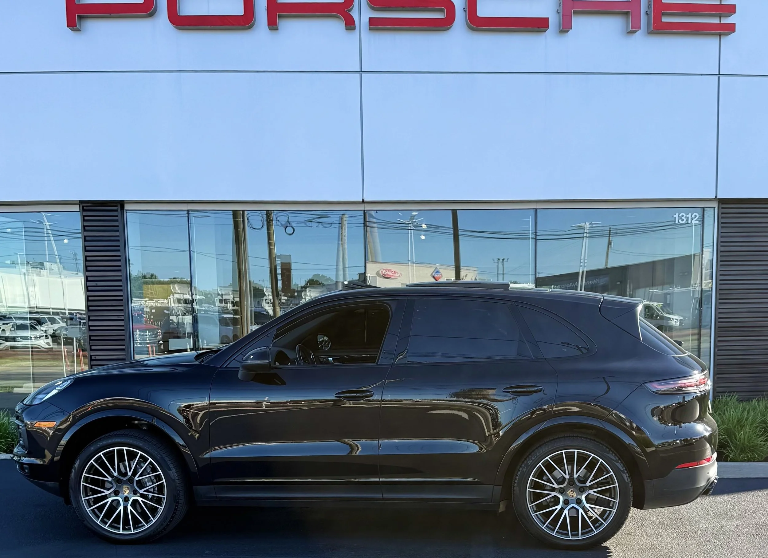 Porsche Cayenne – Seating up to (3) Passengers