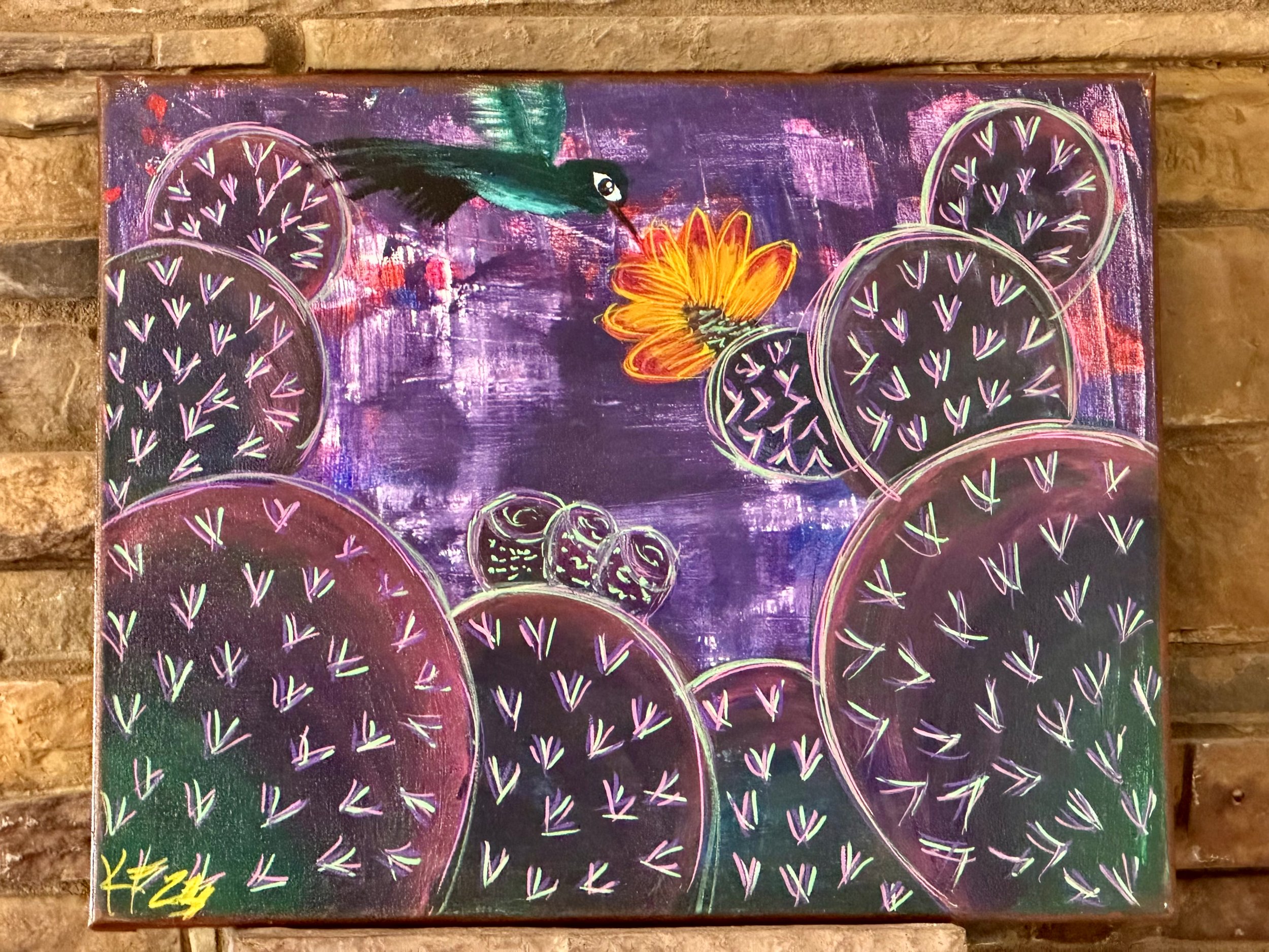 Hummingbird Among the Prickly Pear Cacti