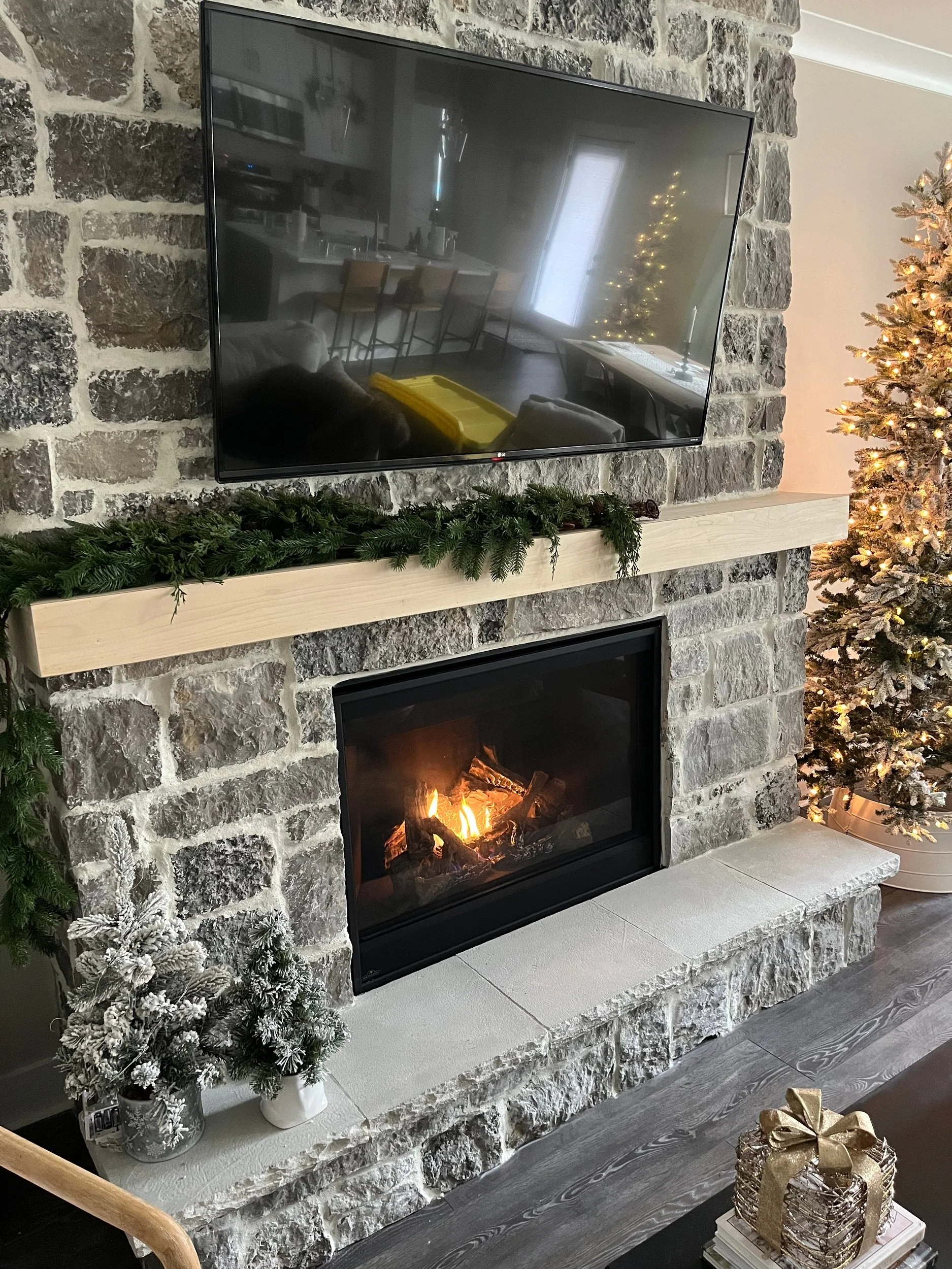 living room stone fireplace w:tv.jpg