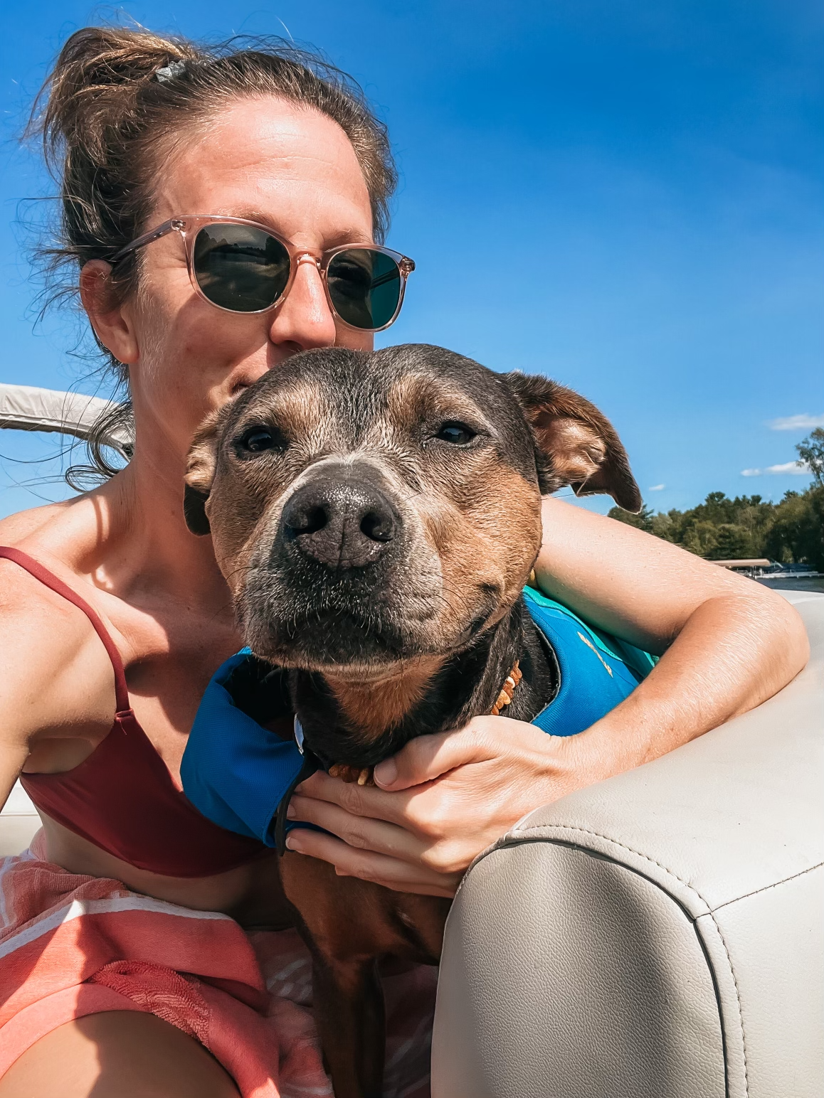 Dr. Elizabeth outdoors with her dog Luna, reflecting the simple, consistent daily practices that support sustainable healing and well-being.