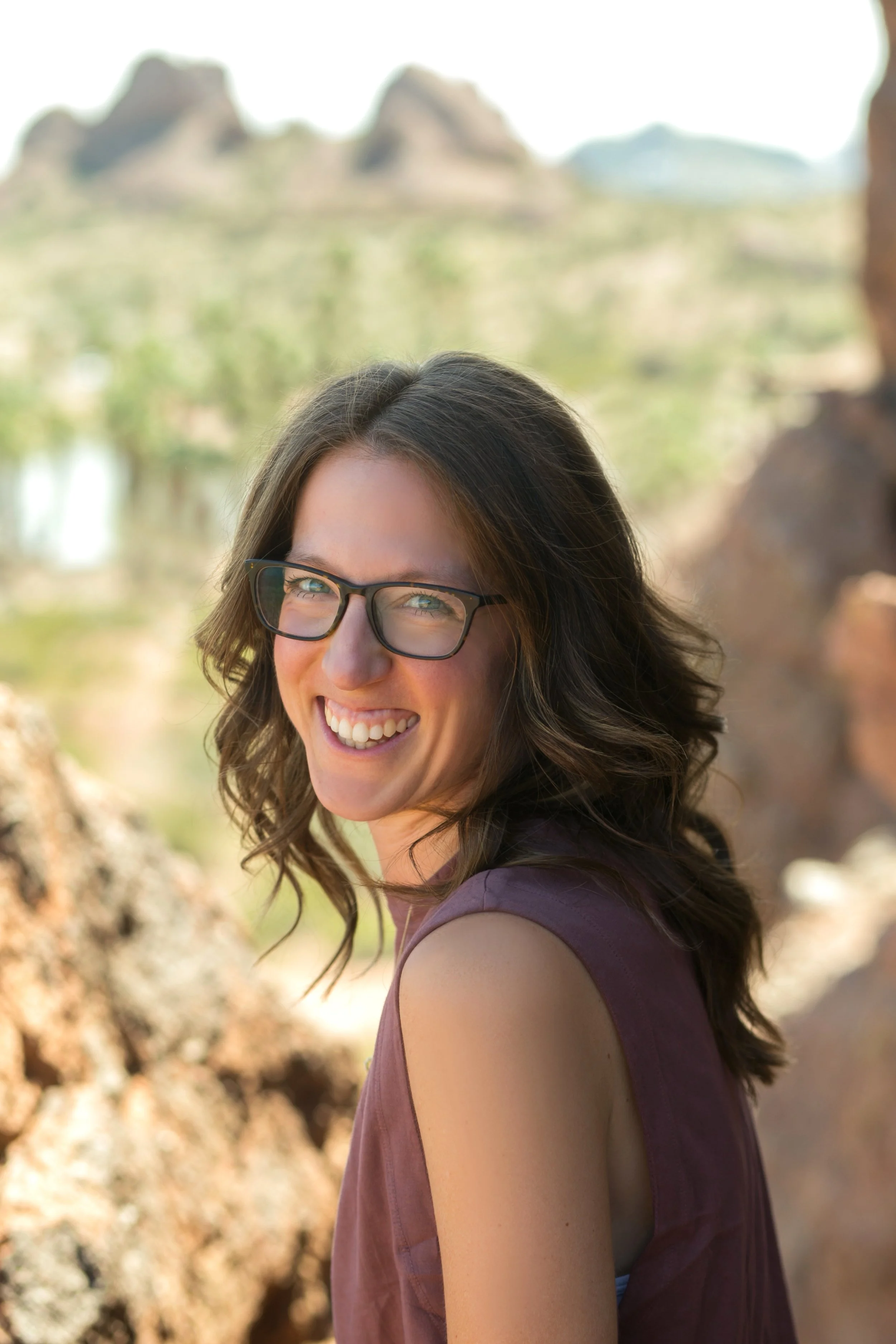 “Dr. Elizabeth standing in the desert celebrating her 35th birthday, symbolizing intuitive healing, personal growth, and connection to nature.”