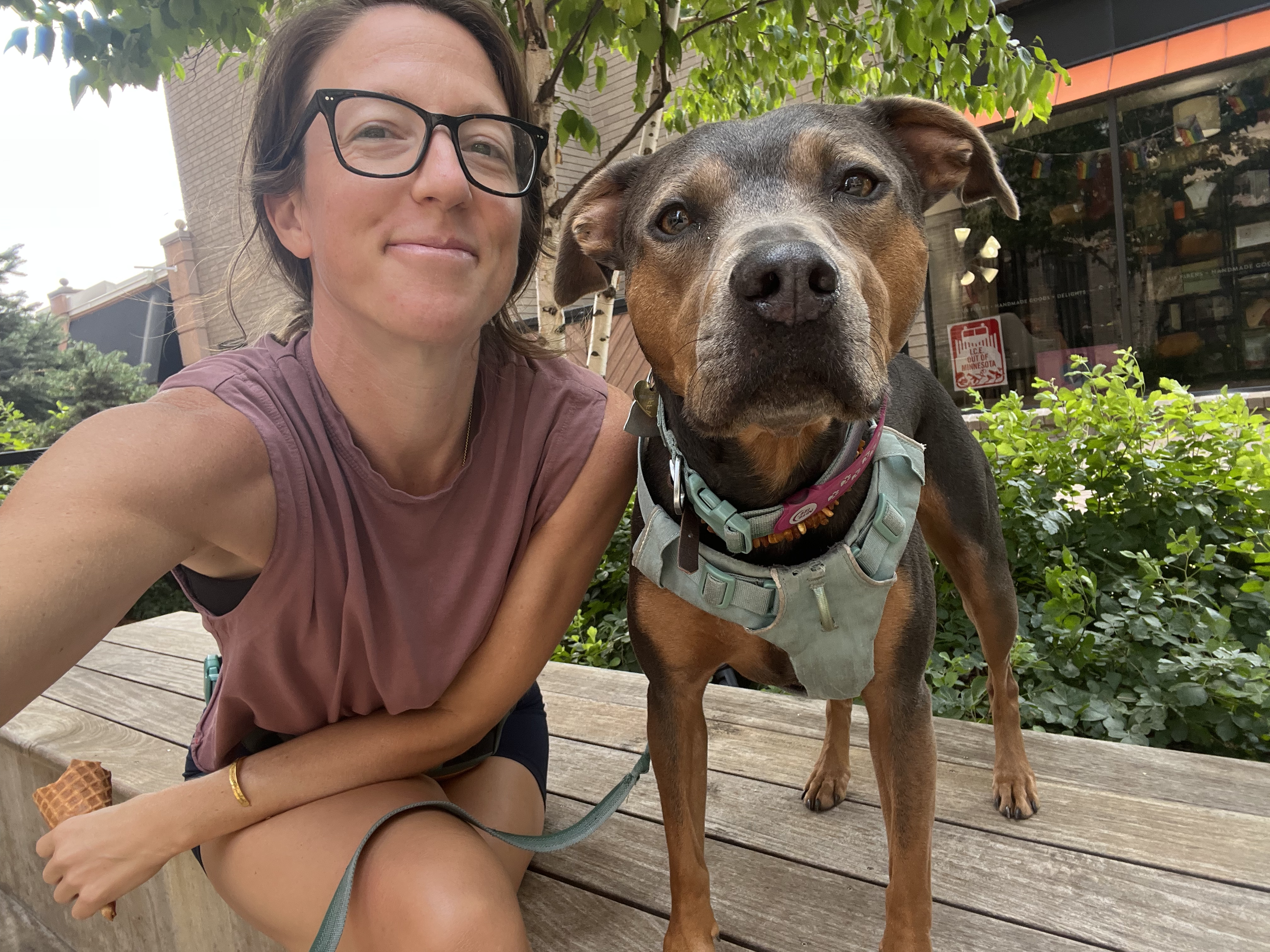 Dr. Elizabeth outdoors with her dog, connecting time in fresh air with Lung support, nervous system regulation, and seasonal wellness.