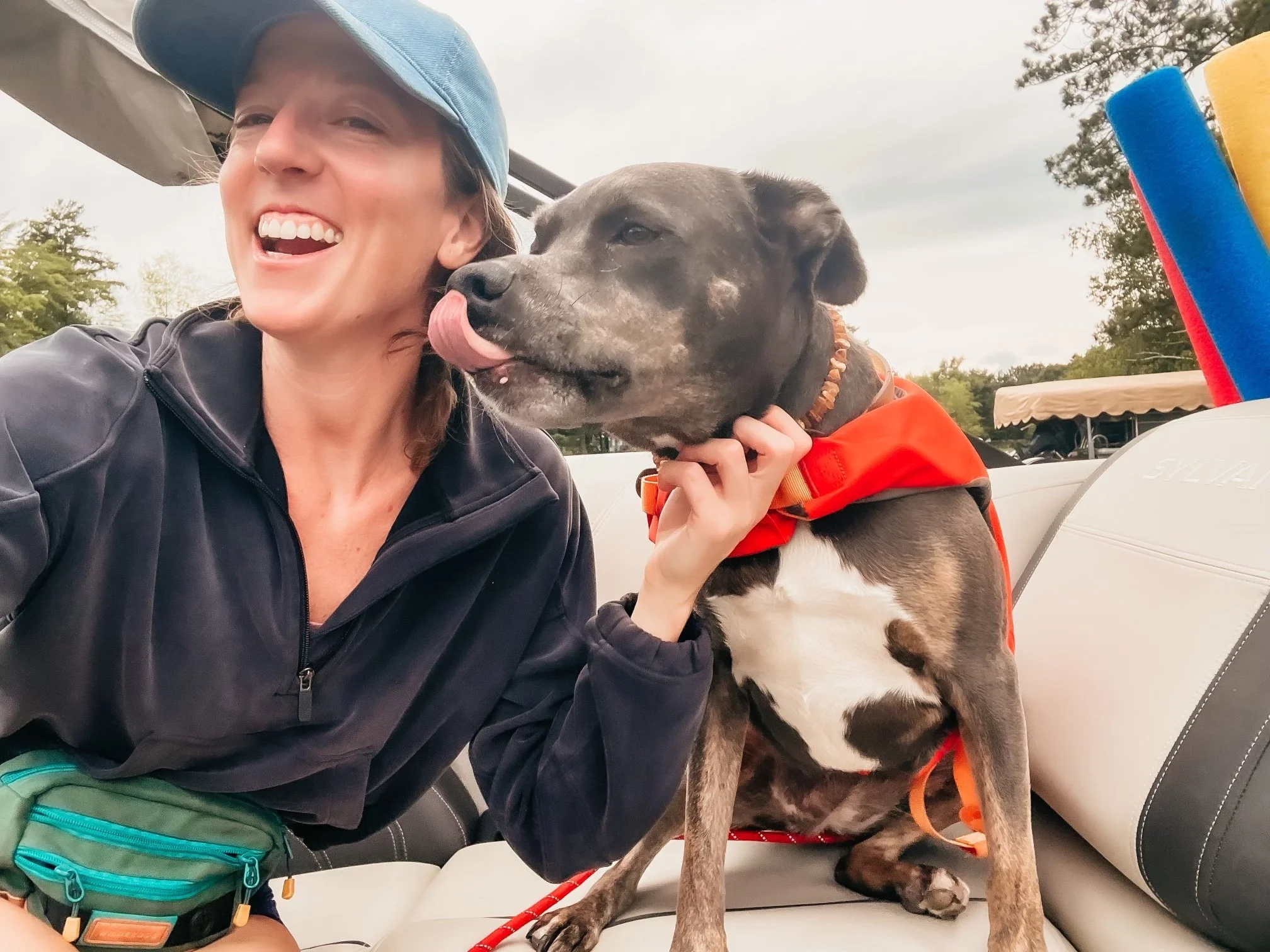 Elizabeth smiling outdoors with Aurora, reflecting on growth and integration at 37.