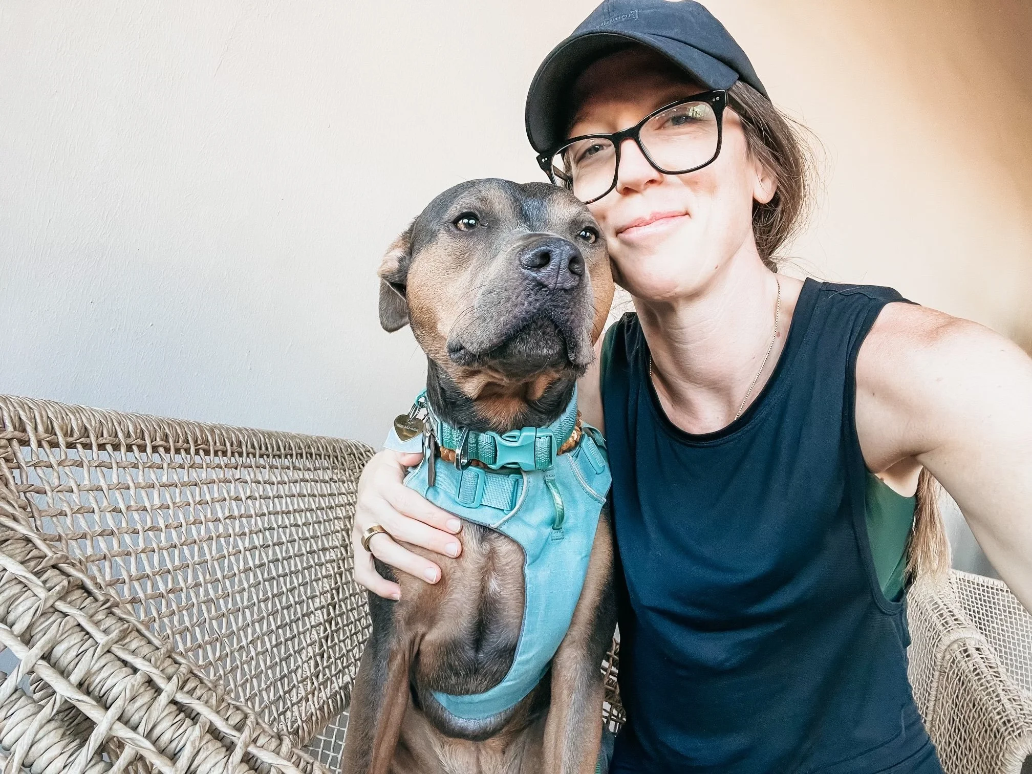 Dr. Elizabeth sitting beside her dog, both looking calm and grounded, reflecting the steady, trusting process of healing, nervous system regulation, and lasting transformation.