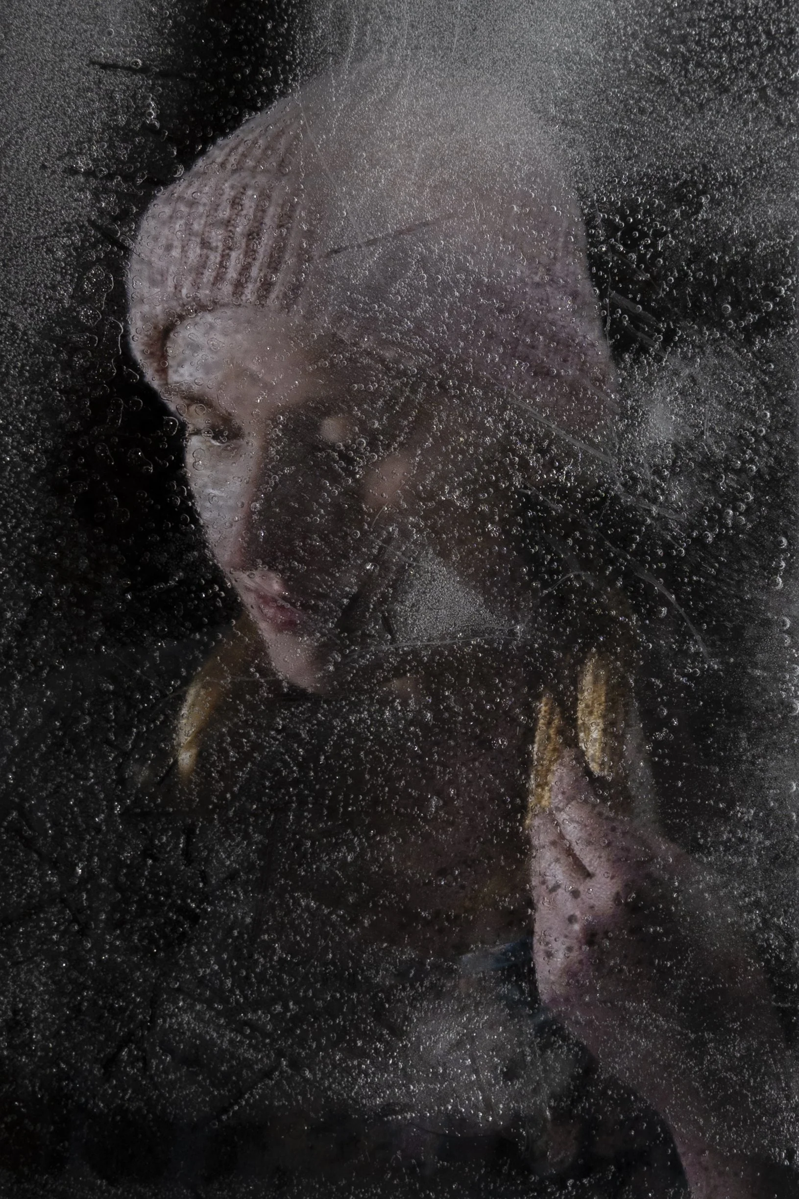 8. Reminisce
Kaitlyns mother kept her hair from just before treatment began and a wig was made recently with it. In this image she is reminded of a time before cancer, the ice represents a moment frozen in time.