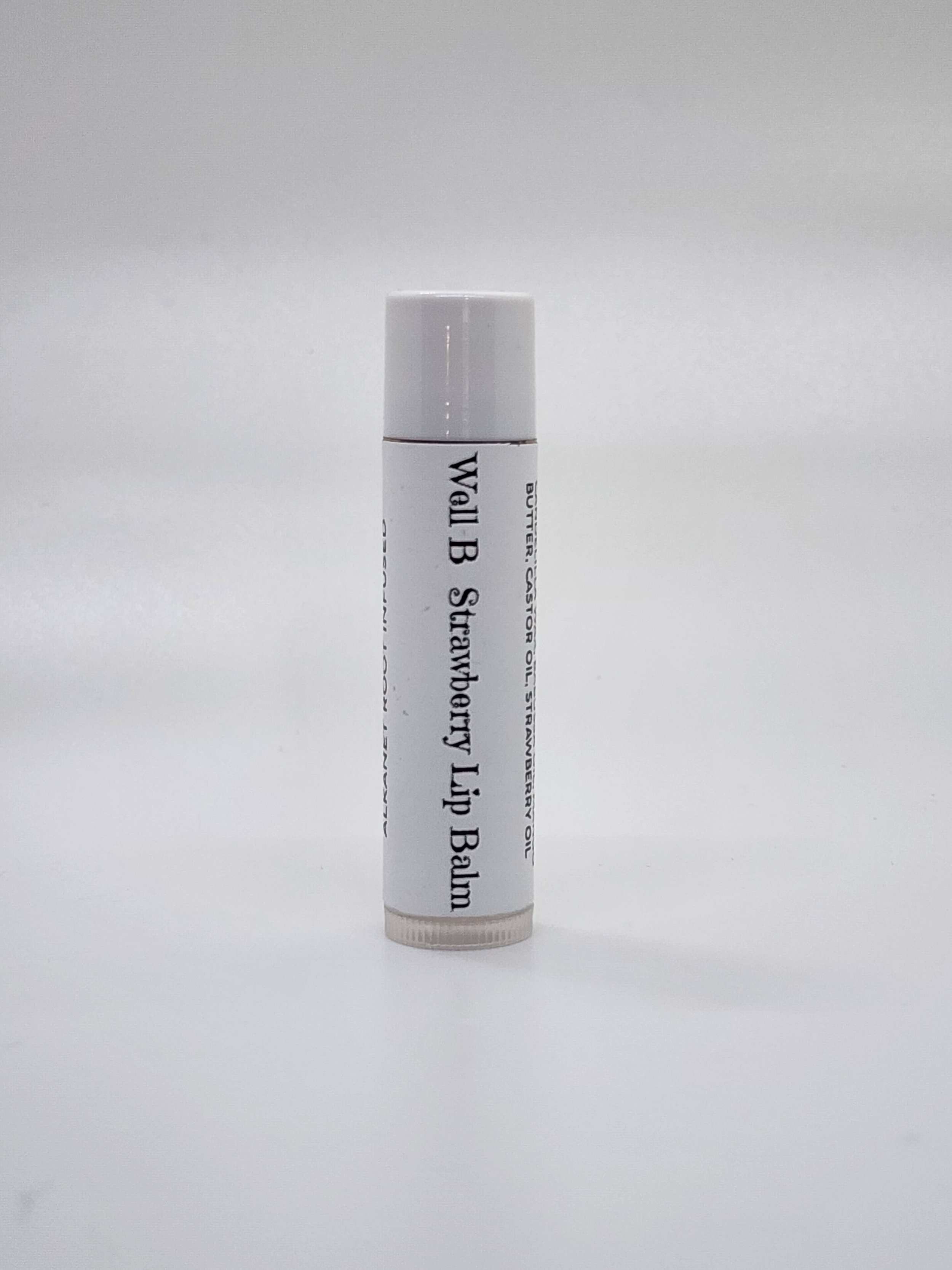 Alkanet infused strawberry lip balm
