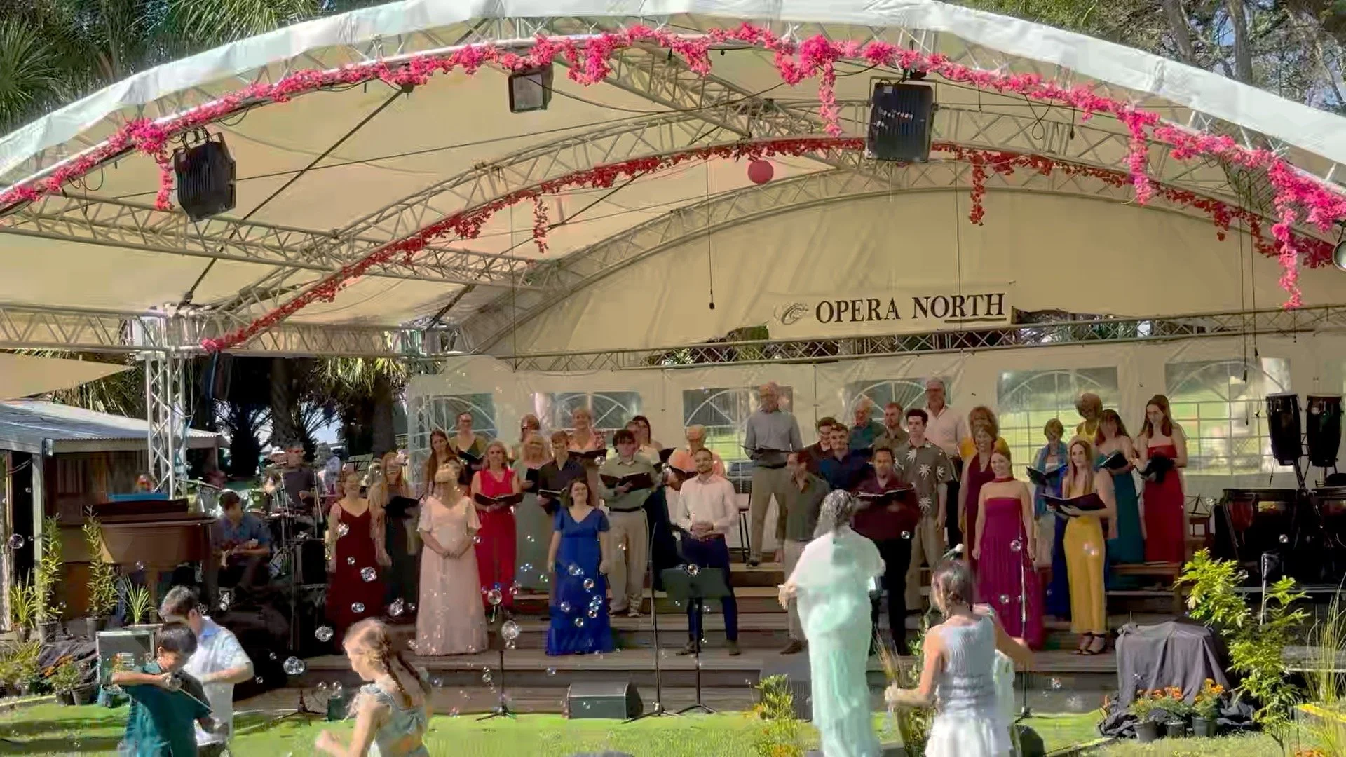 Opera in the Garden 2026 - that moment when Te Korihi o Te Tui childrens choir spread bubbles and laughter!