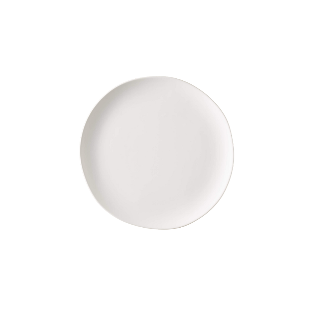 White ceramic plate on a black background.