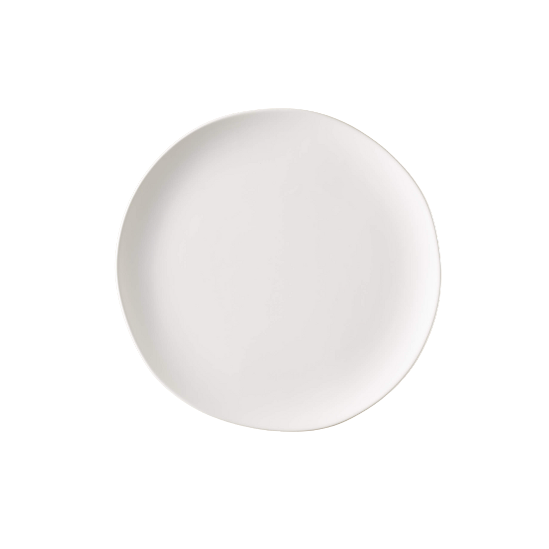 White ceramic dinner plate on black background.