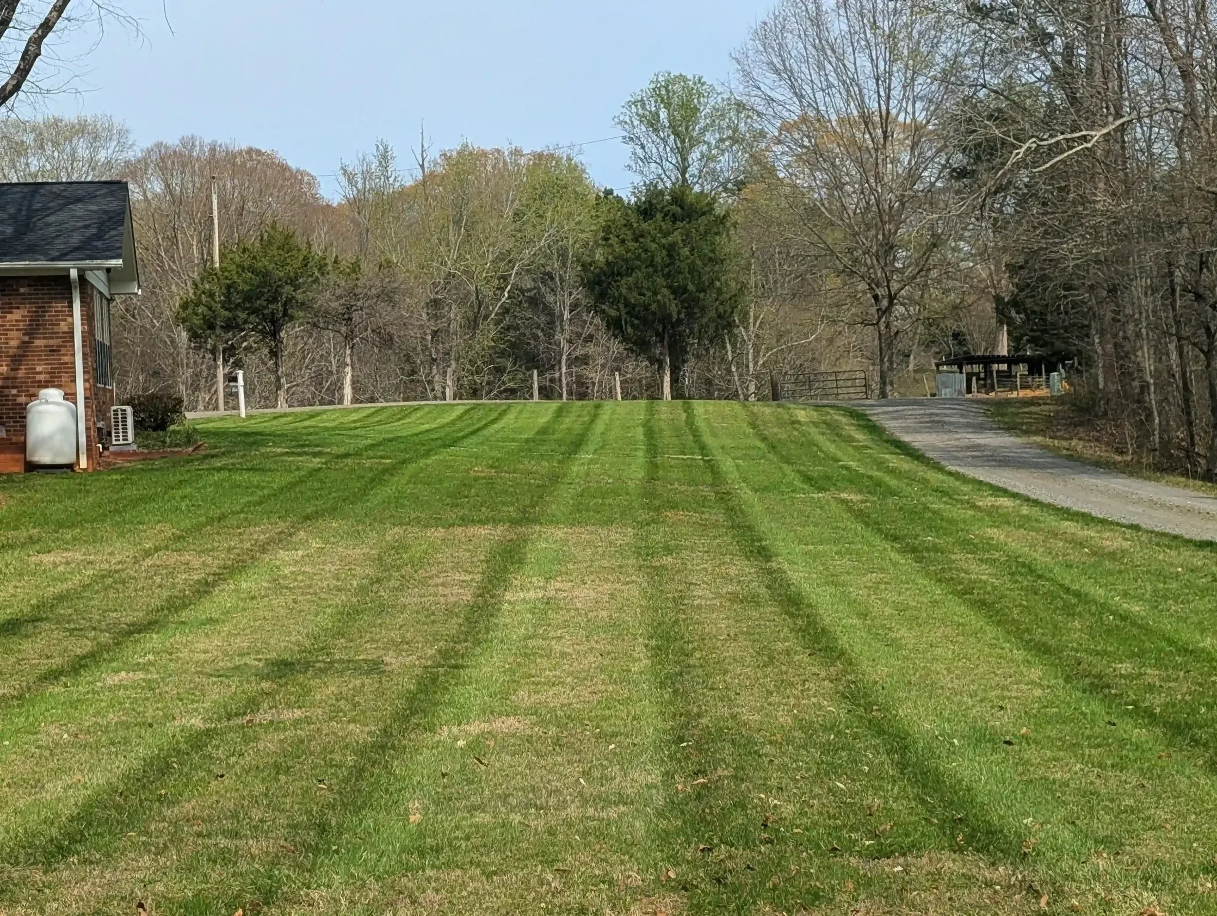 An example of premium quality lawn care in mocksville, davie county area. Beautifully striped yard.