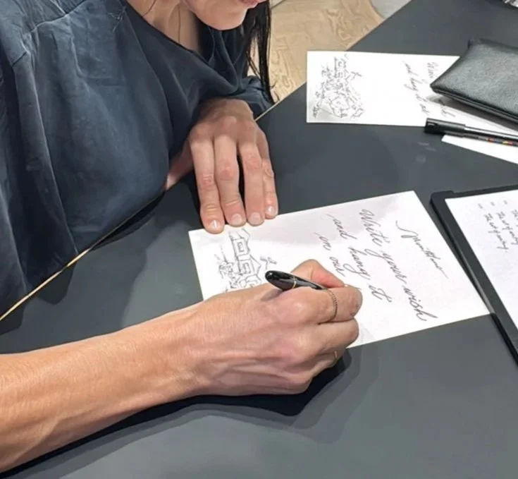 Calligrapher Yianna Korre writing with a Montblanc pen, Christmas wishes in calligraphy