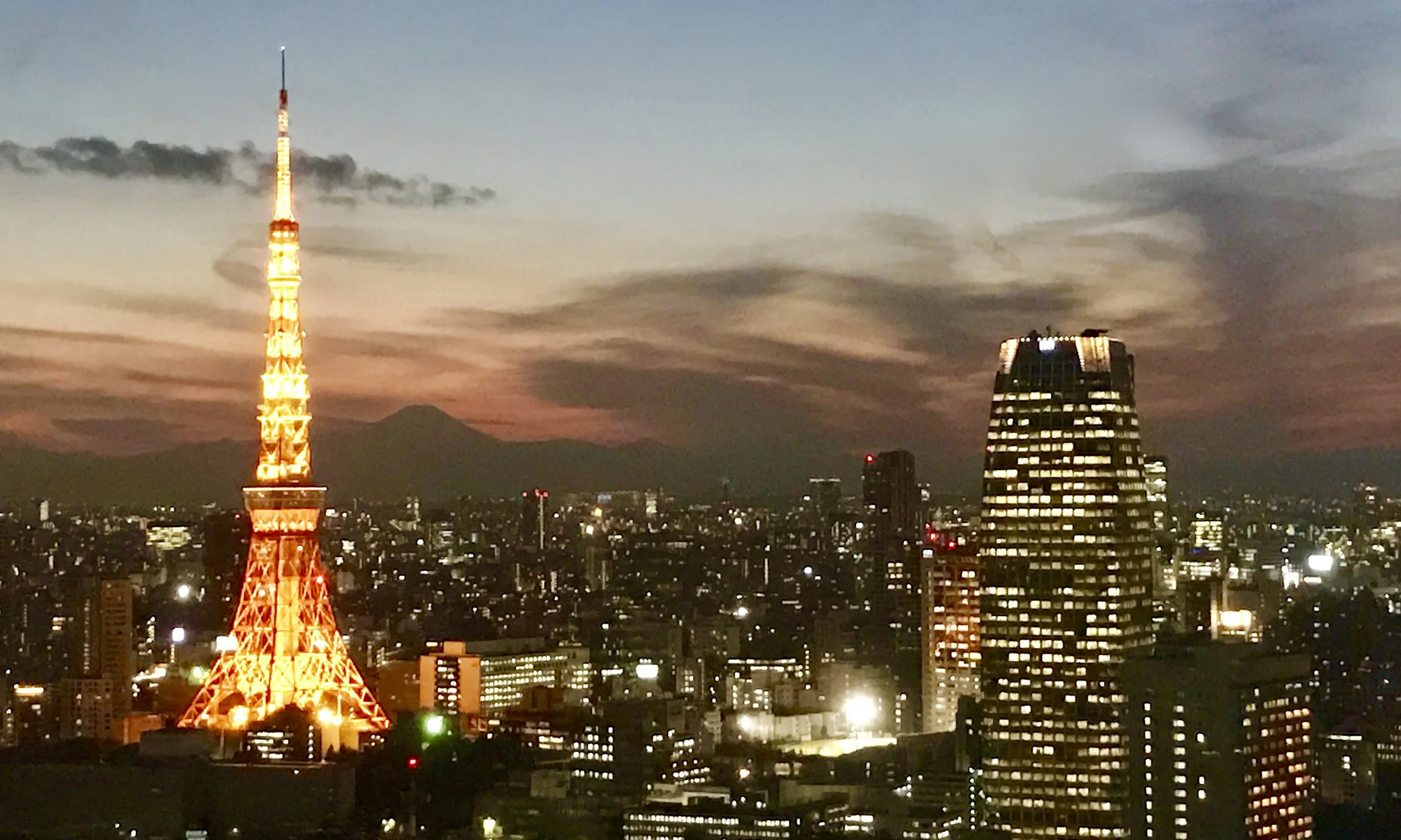 Tokyo Tower and Mt Fuji at night with a sunset backdrop, photographed by Will of Kuso Oishii.