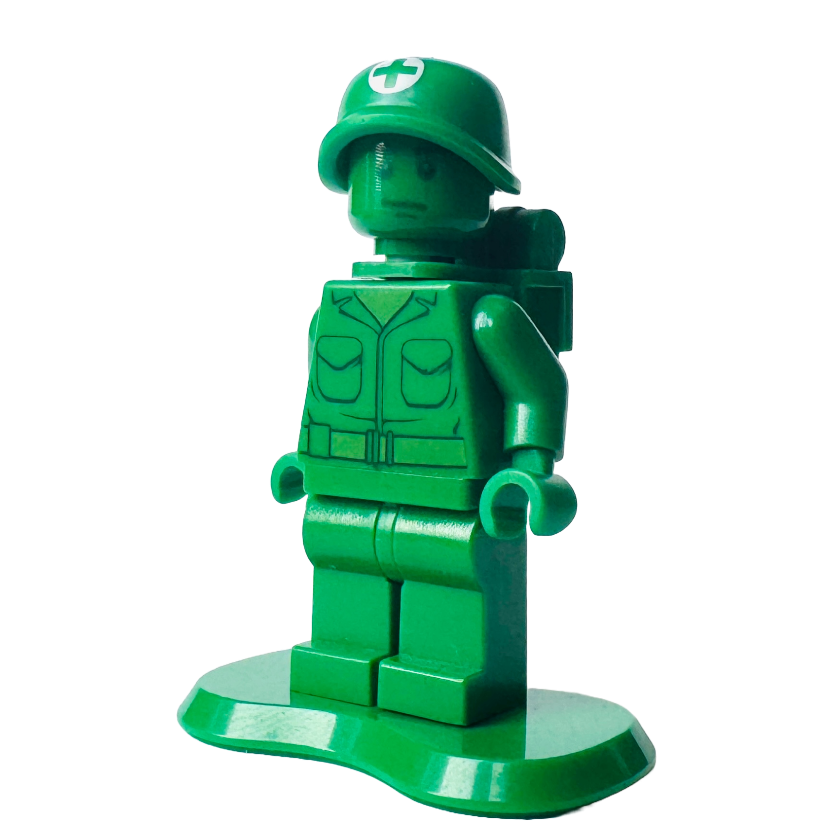 1.	Front view of LEGO Green Army Man Medic (toy002) with medical backpack.