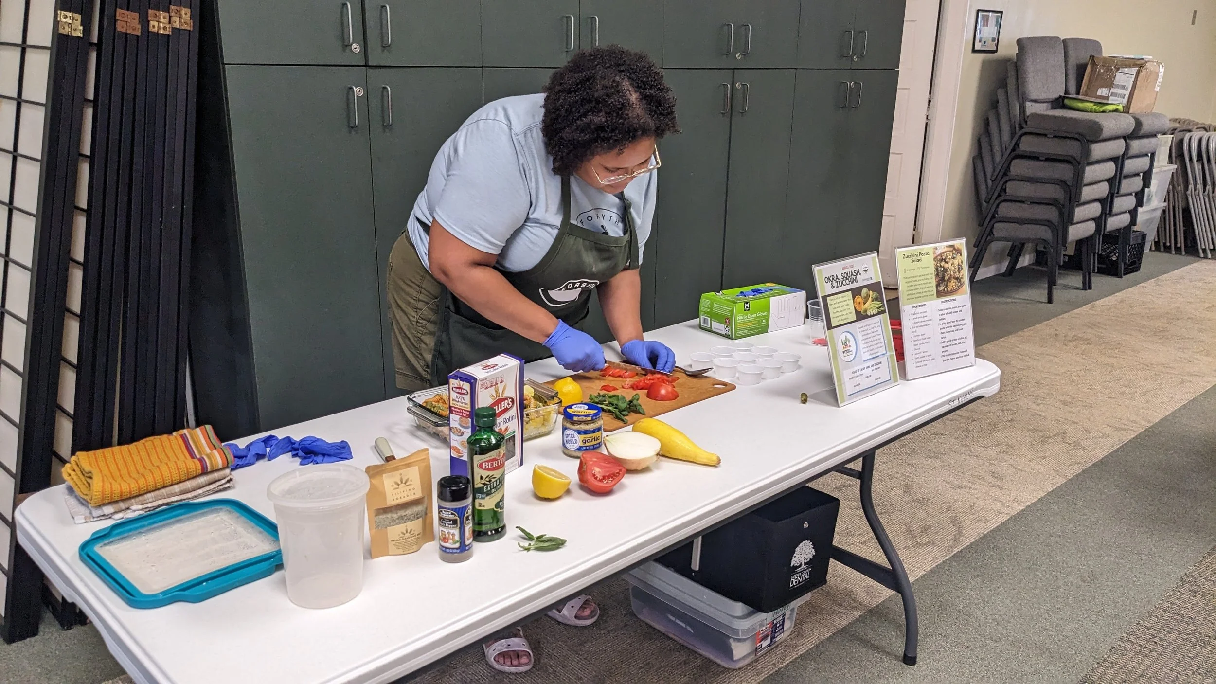Asia Harold prepares a healthy recipe for a nutrition demonstration during the 2025 Food Farmacy cohort