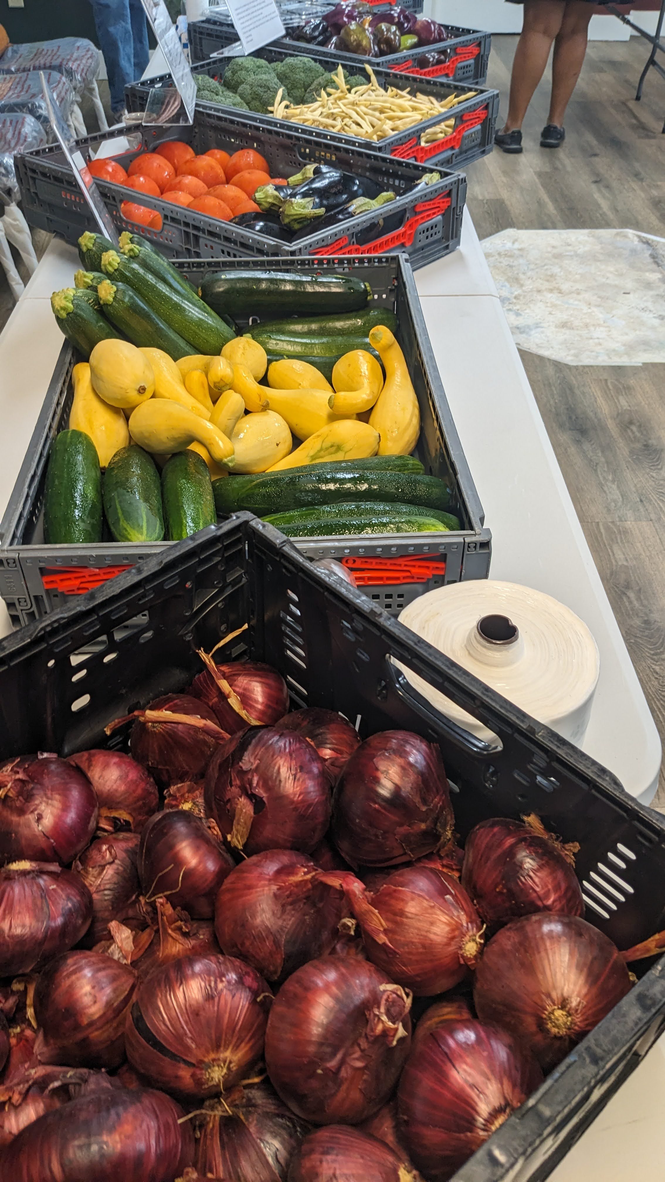 Trays of local, farm fresh produce available for purchase during the 2025 Food Farmacy