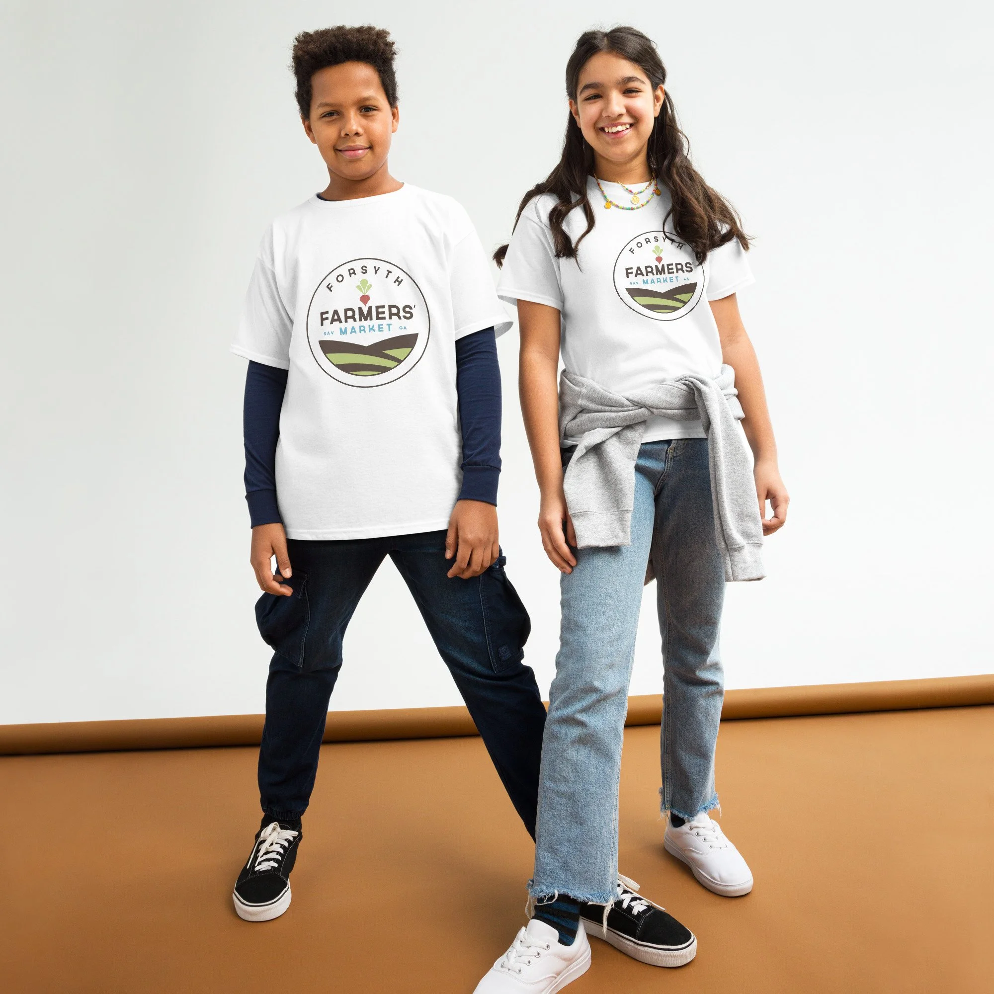 Seeds & Sprouts youth T-shirt featuring the full-color Forsyth Farmers' Market logo