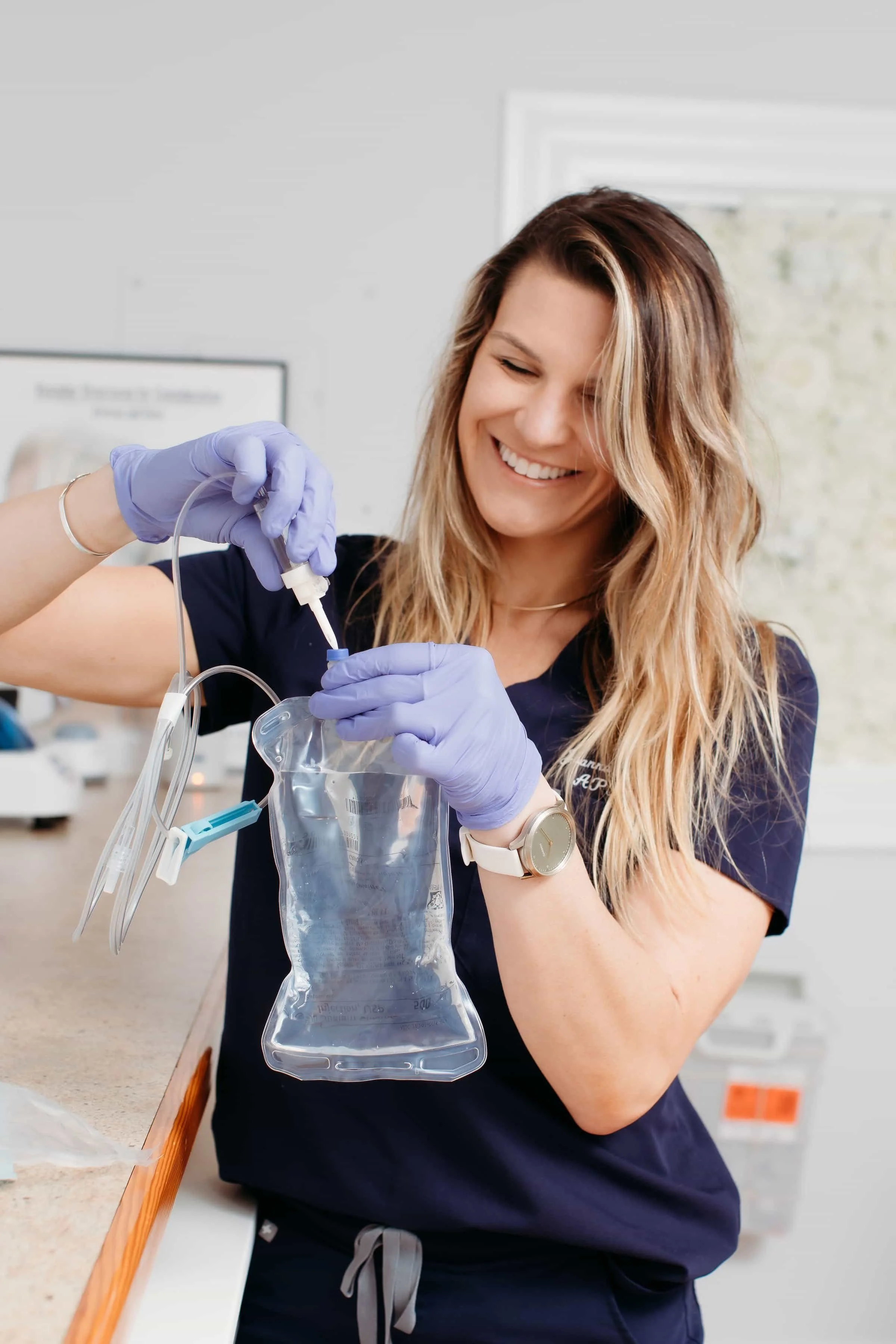medspa nurse with IV therapy bag