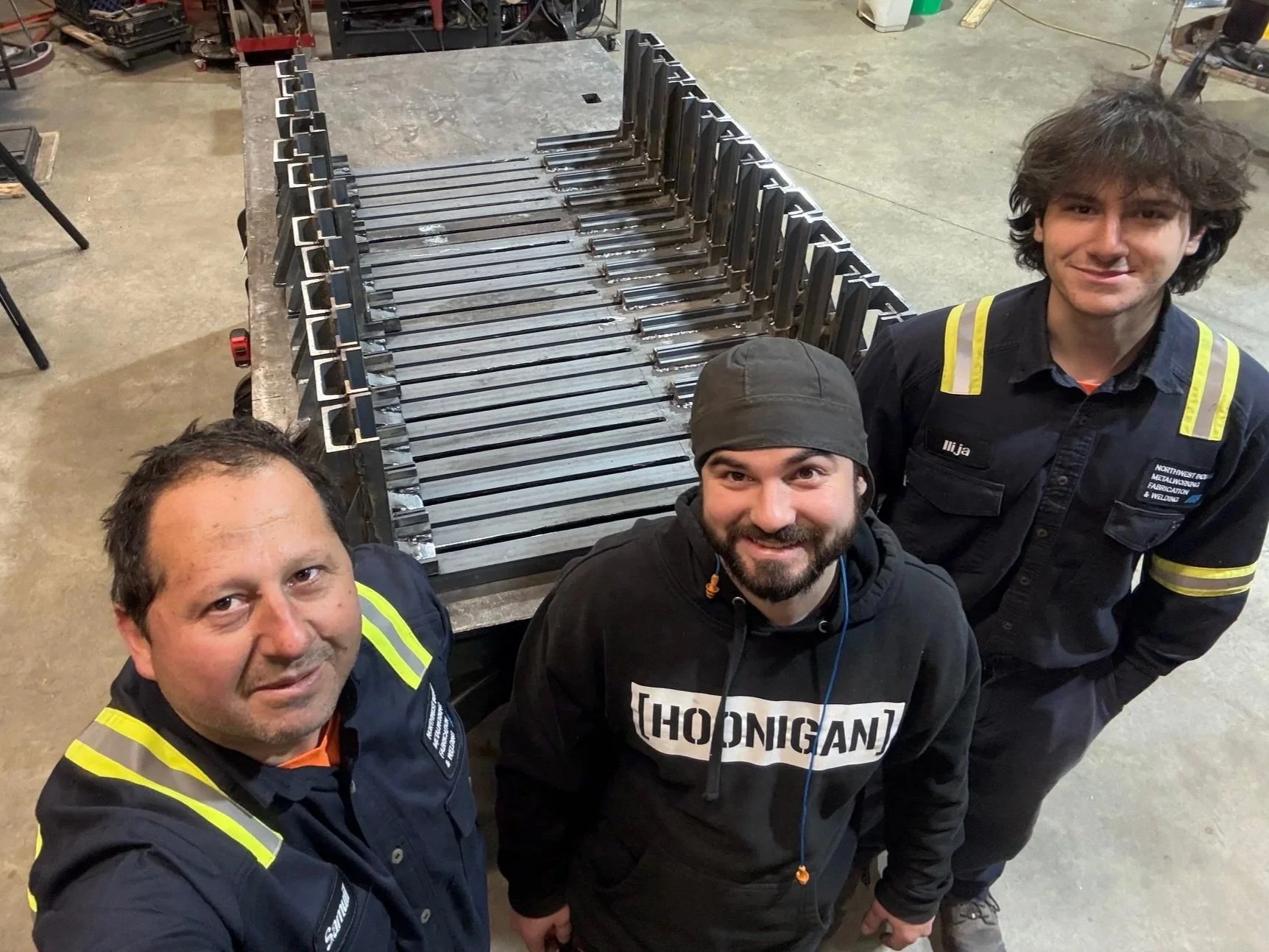 A RUN OF 12 CUSTOM PALLET BANDS THE GUYS GOT ALL WELDED UP PRECISELY 