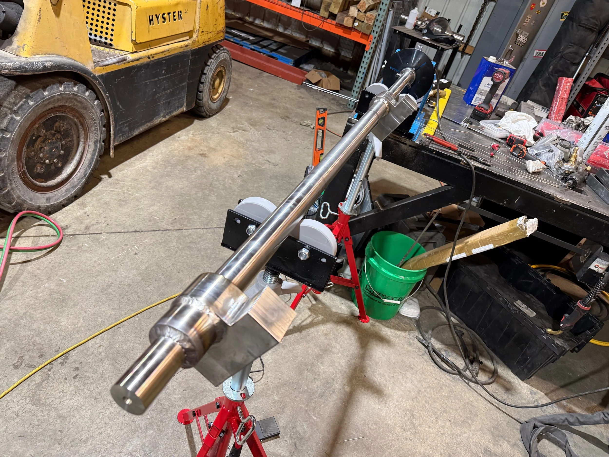 STAINLESS STEEL SHAFT FOR A FOOD GRADE WE WELDED TO SPEC FOR OUR MACHINE SHOP TO FINISH