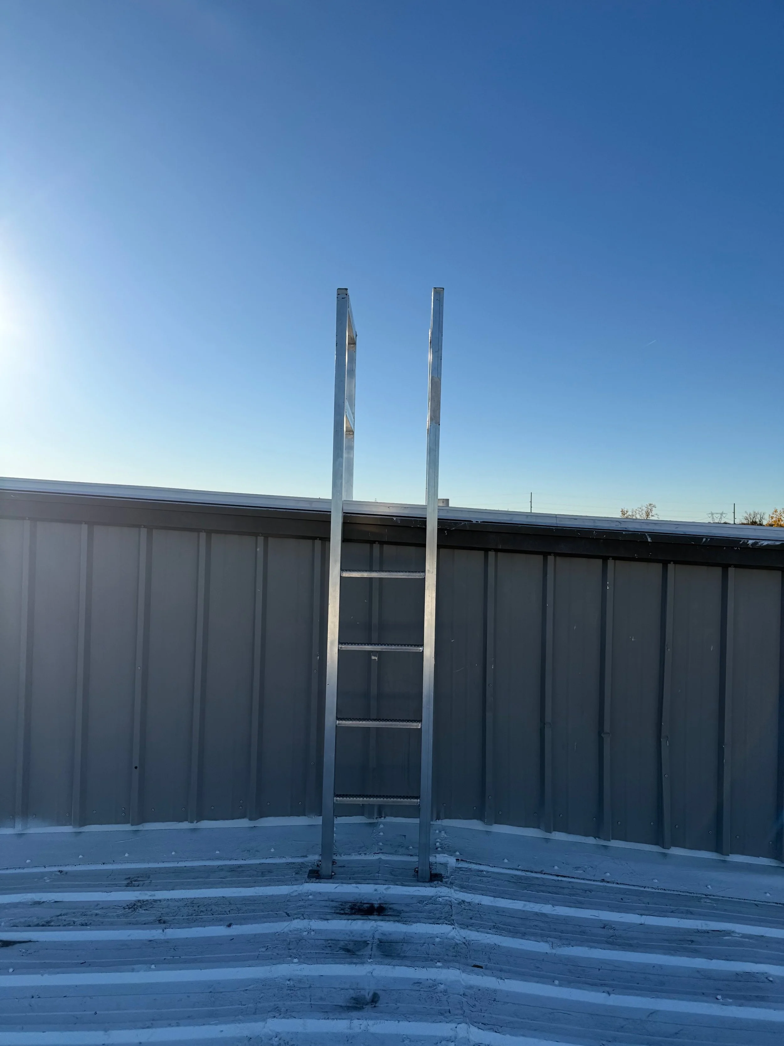 ALSO NEEDED AN EXTERNAL ALUMINUM LADDER WE FABRICATED IN THE SHOP AND INSTALLED IN THE FIELD