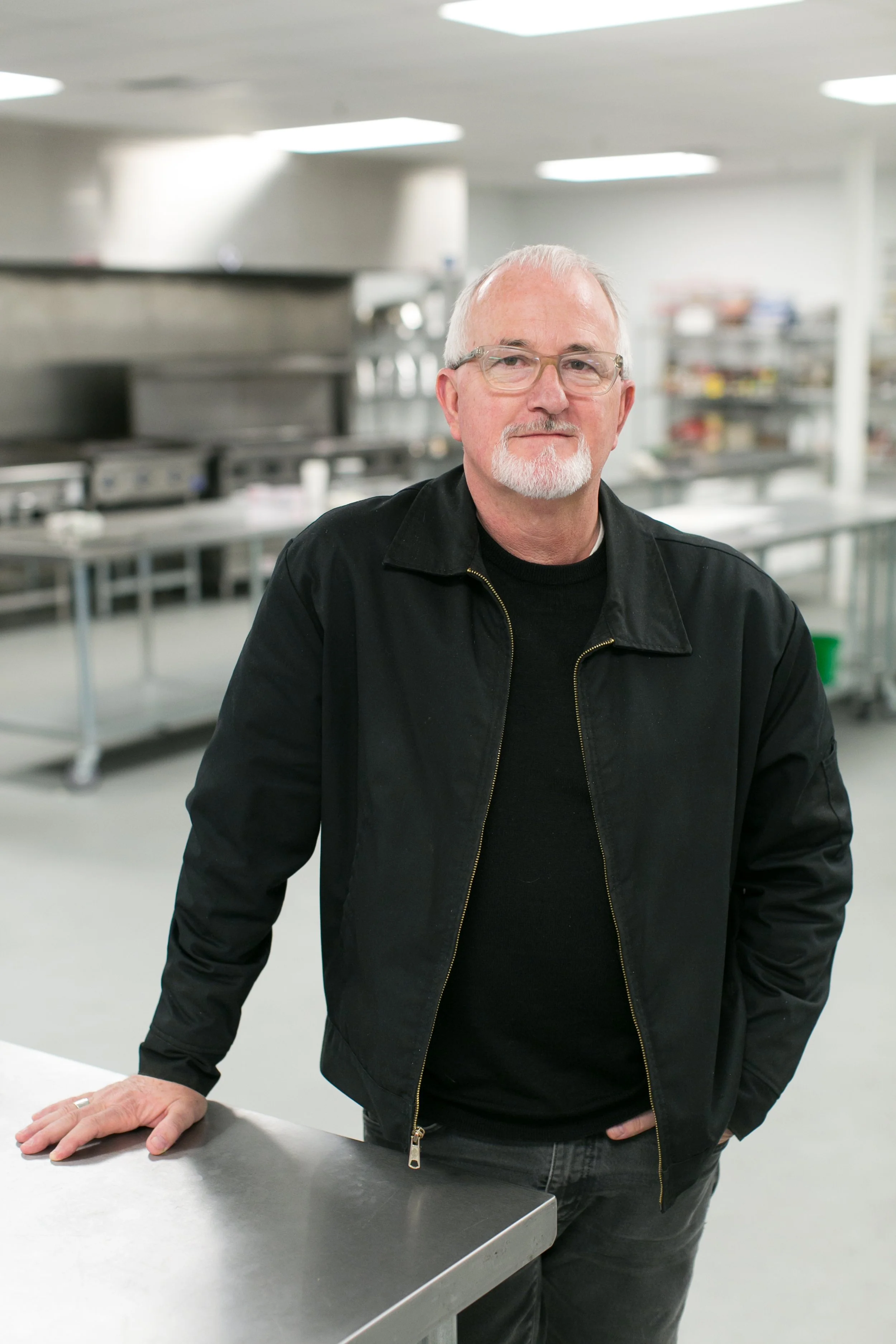 Photo of Robert Egger, in a kitchen