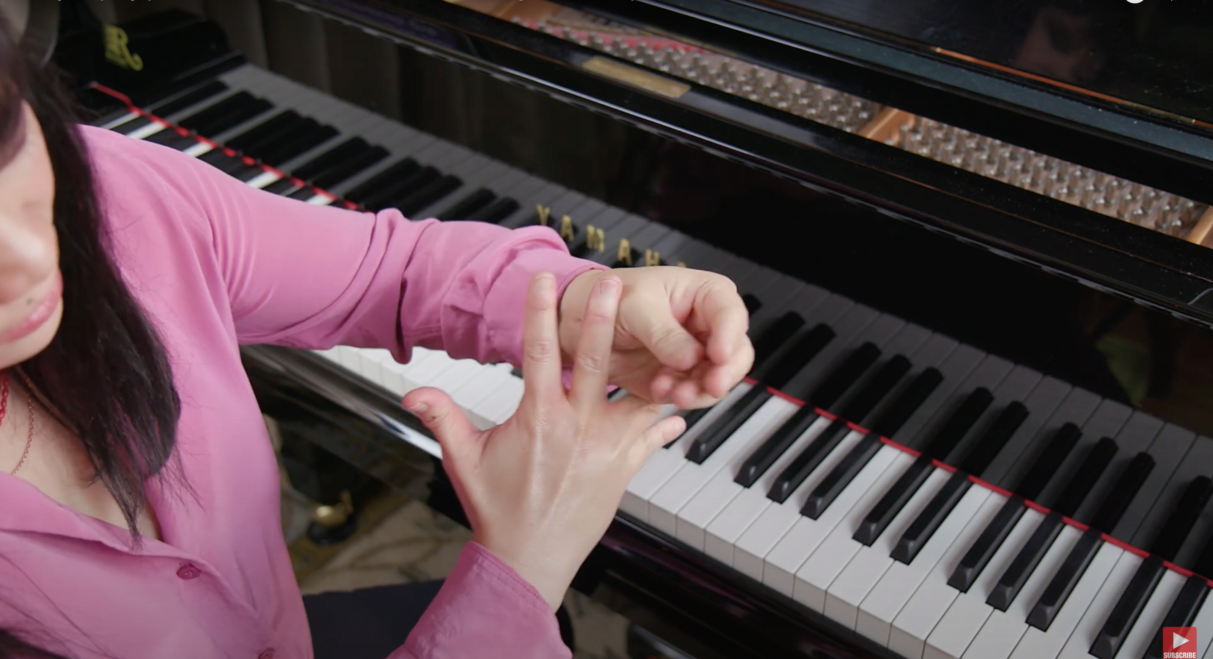 Close-up of piano hand technique identifying weak passages and technical blind spots.