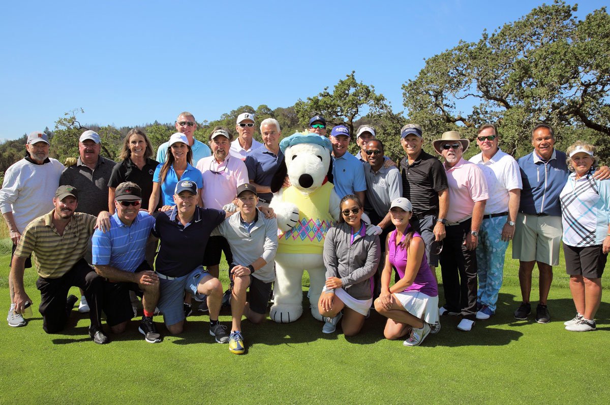 Celebrities with Snoopy at golf tournament