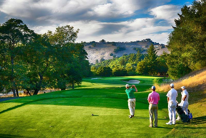 Golfers teeing off at Mayacama Golf Club