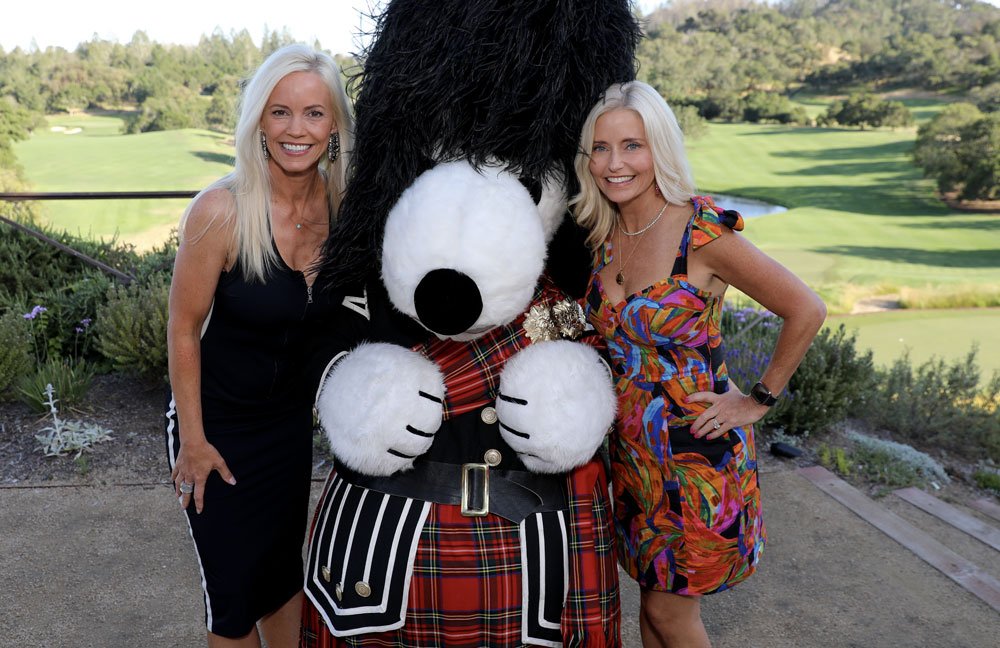 Lisa O'Hurley and friend with snoopy dressed in Tartan